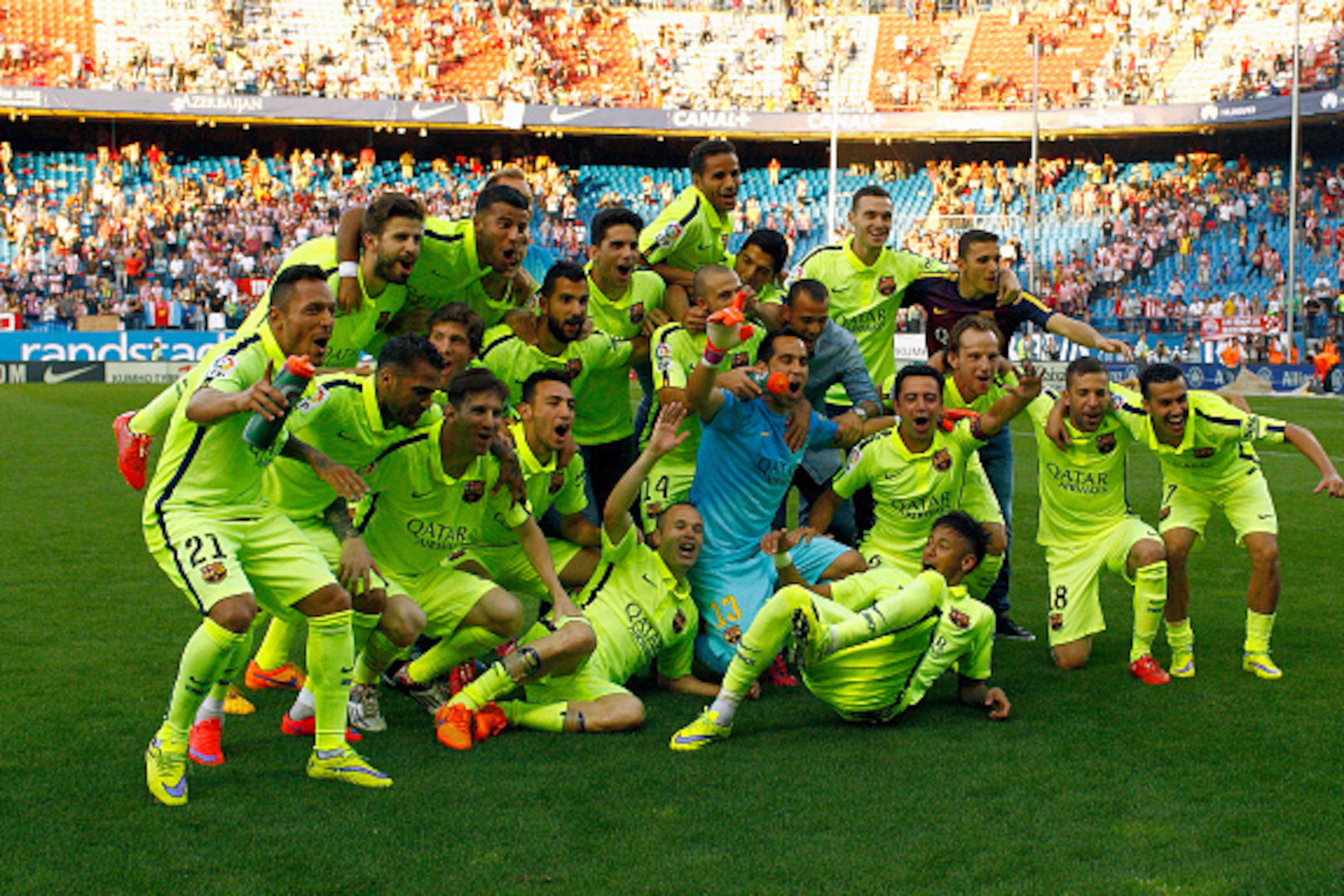 MADRID, SPAIN - MAY 17: Barcelona players celebrate winning the title after the La Liga match between Club Atletico de Madrid and FC Barcelona at Vicente Calderon Stadium on May 17, 2015 in Madrid, Spain. Barcelona are champions after a 1-0 victory. (Pho MADRID, SPAIN - MAY 17: Barcelona players celebrate winning the title after the La Liga match between Club Atletico de Madrid and FC Barcelona at Vicente Calderon Stadium on May 17, 2015 in Madrid, Spain. Barcelona are champions after a 1-0 victory. (Pho