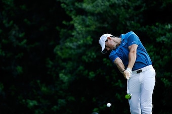 CHARLOTTE, NC - MAY 17:  Rory McIlroy of Northern Ireland tees off on the 14th hole during the final round at the Wells Fargo Championship at Quail Hollow Club on May 17, 2015 in Charlotte, North Carolina.  (Photo by Jeff Gross/Getty Images)