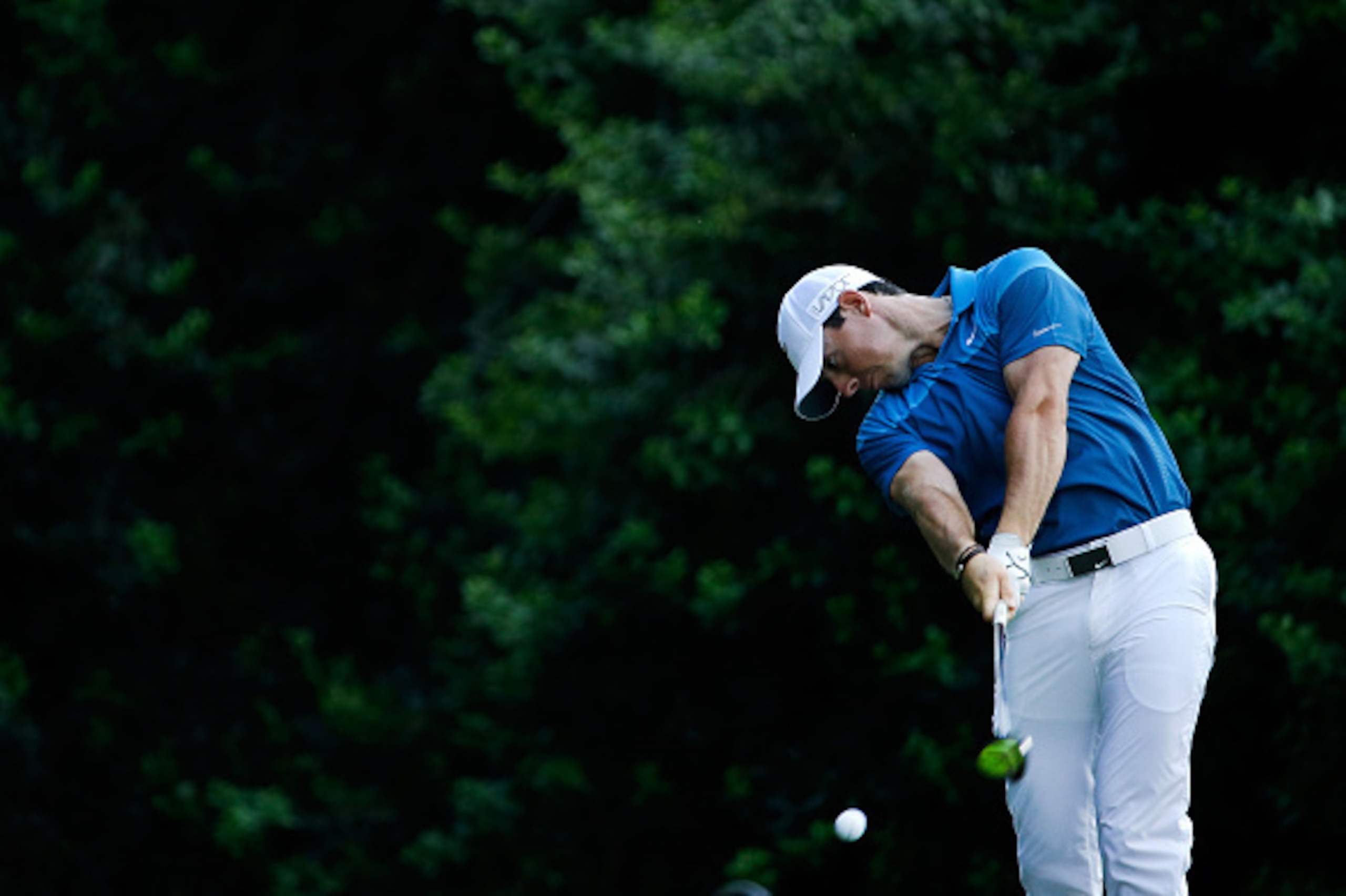 CHARLOTTE, NC - MAY 17:  Rory McIlroy of Northern Ireland tees off on the 14th hole during the final round at the Wells Fargo Championship at Quail Hollow Club on May 17, 2015 in Charlotte, North Carolina.  (Photo by Jeff Gross/Getty Images)