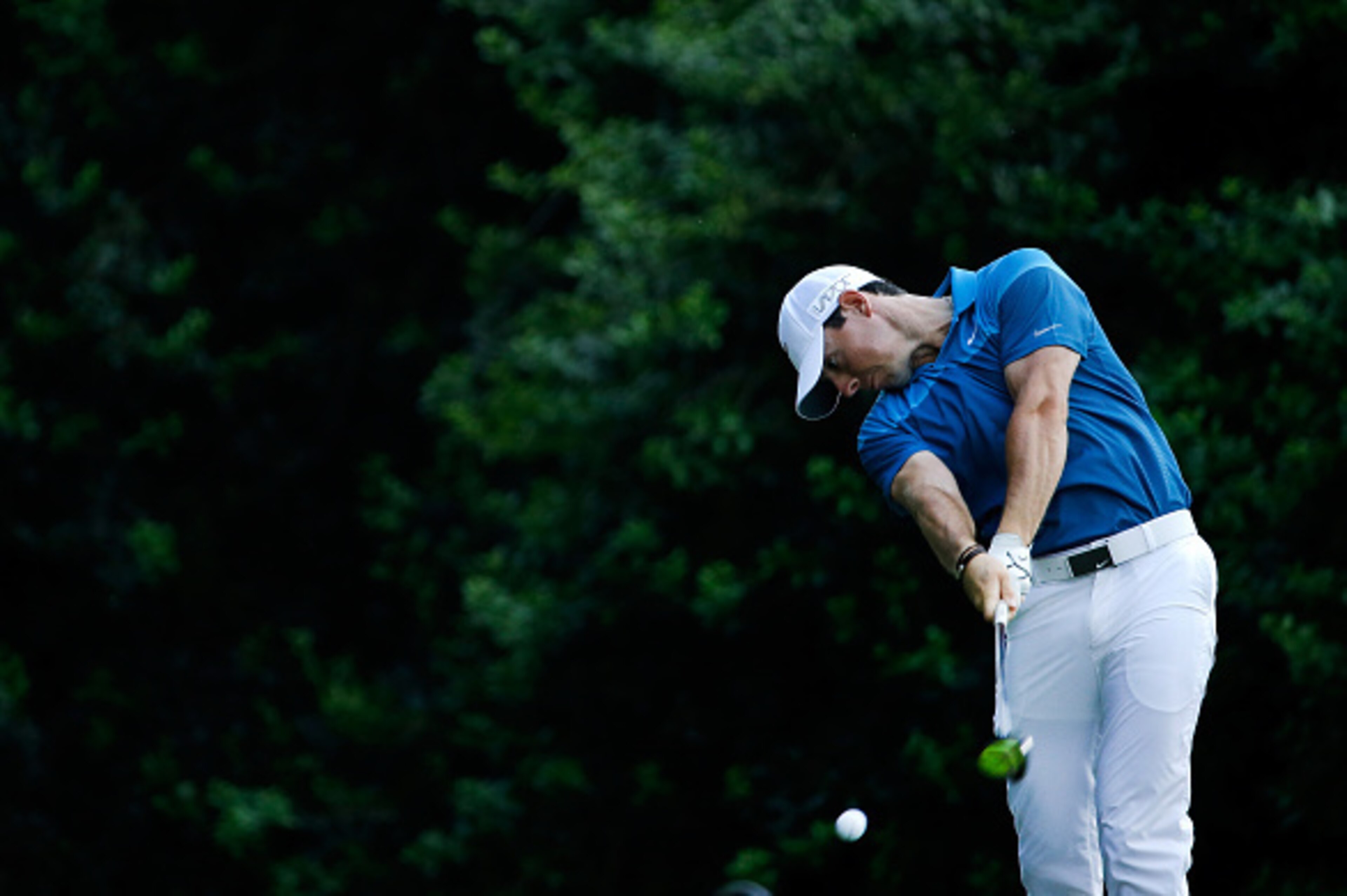 CHARLOTTE, NC - MAY 17:  Rory McIlroy of Northern Ireland tees off on the 14th hole during the final round at the Wells Fargo Championship at Quail Hollow Club on May 17, 2015 in Charlotte, North Carolina.  (Photo by Jeff Gross/Getty Images)
