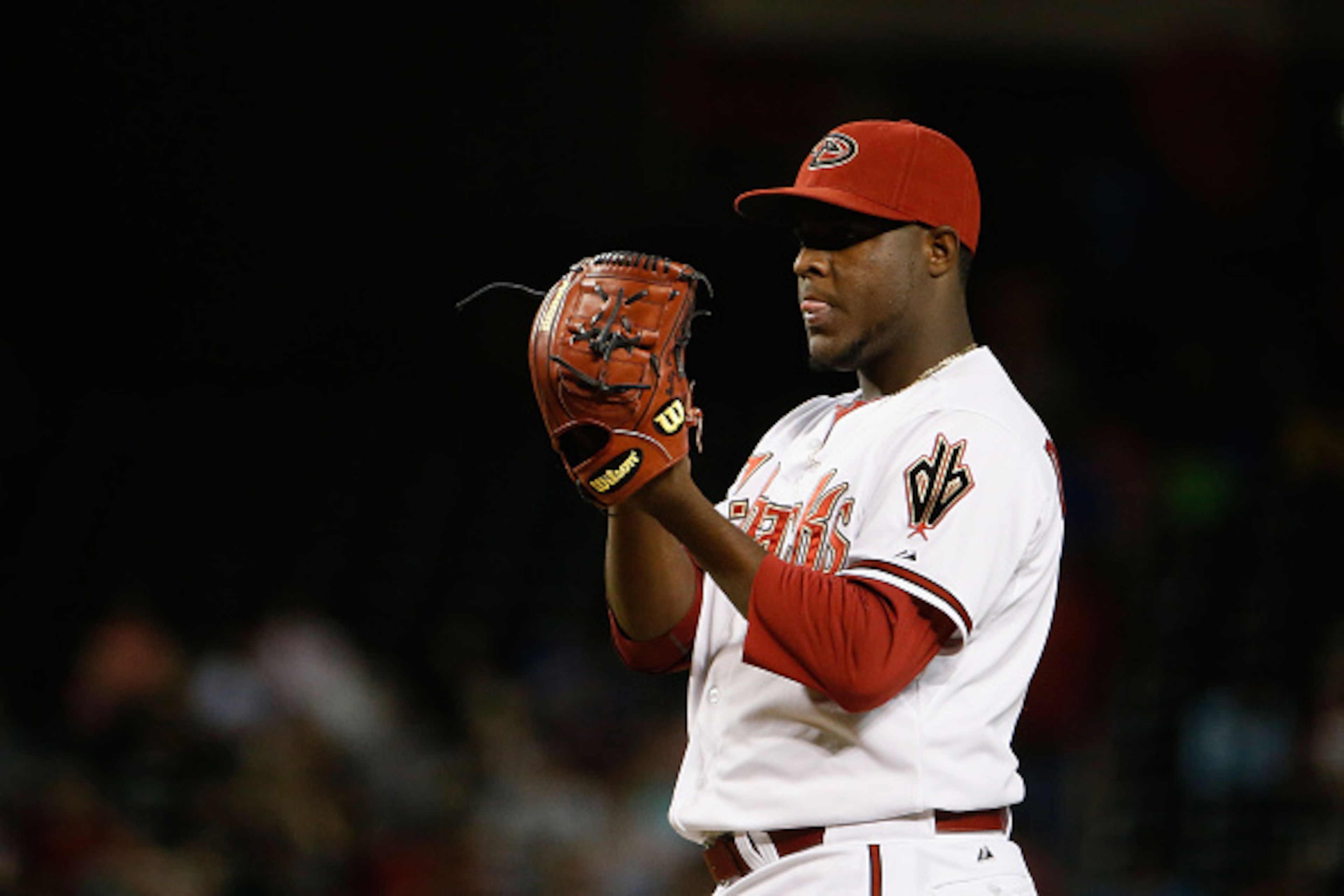 PHOENIX, AZ - MAY 12:  Starting pitcher Rubby De La Rosa #12 of the Arizona Diamondbacks pitches against the Washington Nationals during the MLB game at Chase Field on May 12, 2015 in Phoenix, Arizona.  (Photo by Christian Petersen/Getty Images)