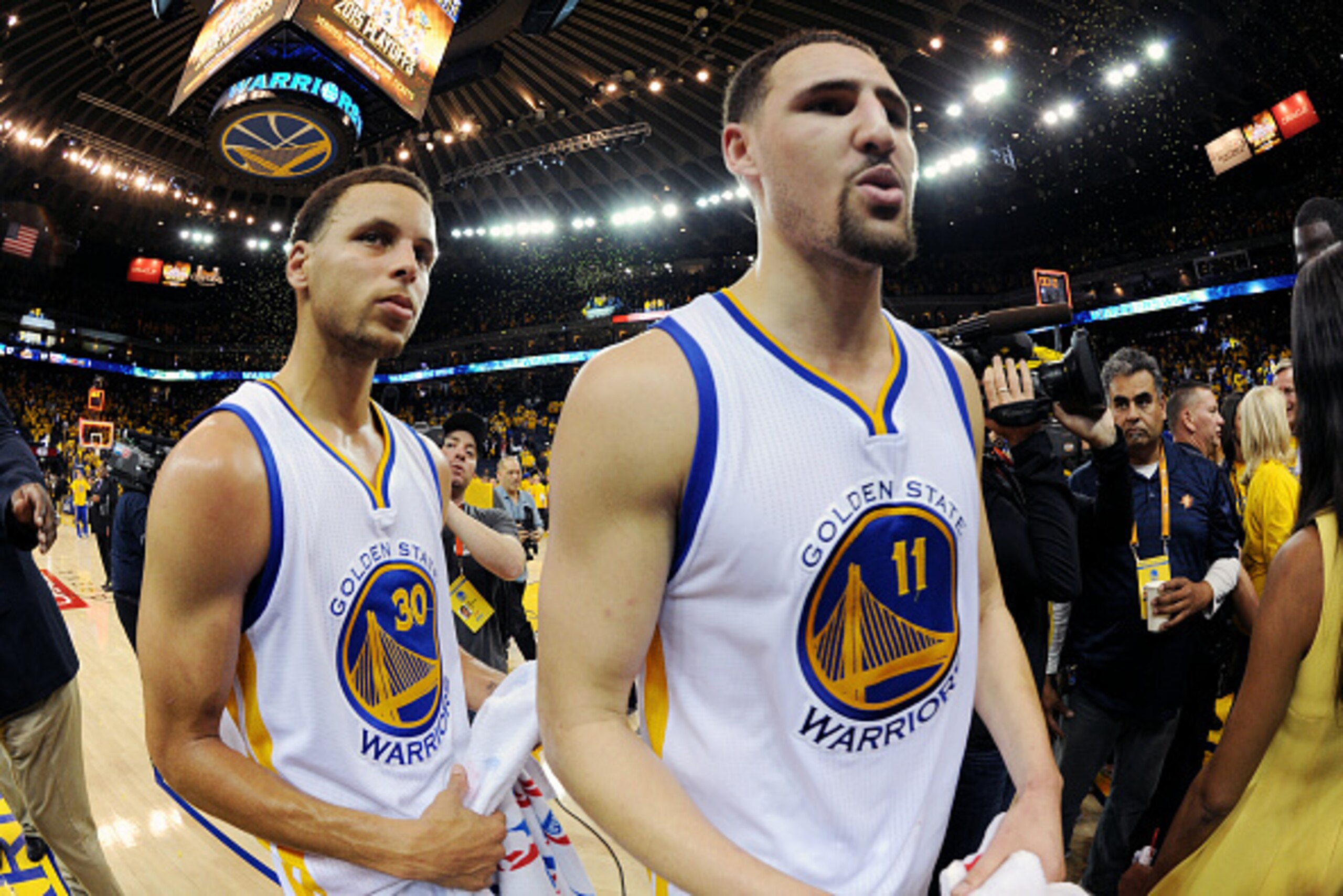 OAKLAND, CA - APRIL 20: Stephen Curry #30 and Klay Thompson #11 of the Golden State Warriors after a game against the New Orleans Pelicans in Game Two of the Western Conference Quarterfinals of the 2015 NBA Playoffs on April 20, 2015 at Oracle Arena in Oa