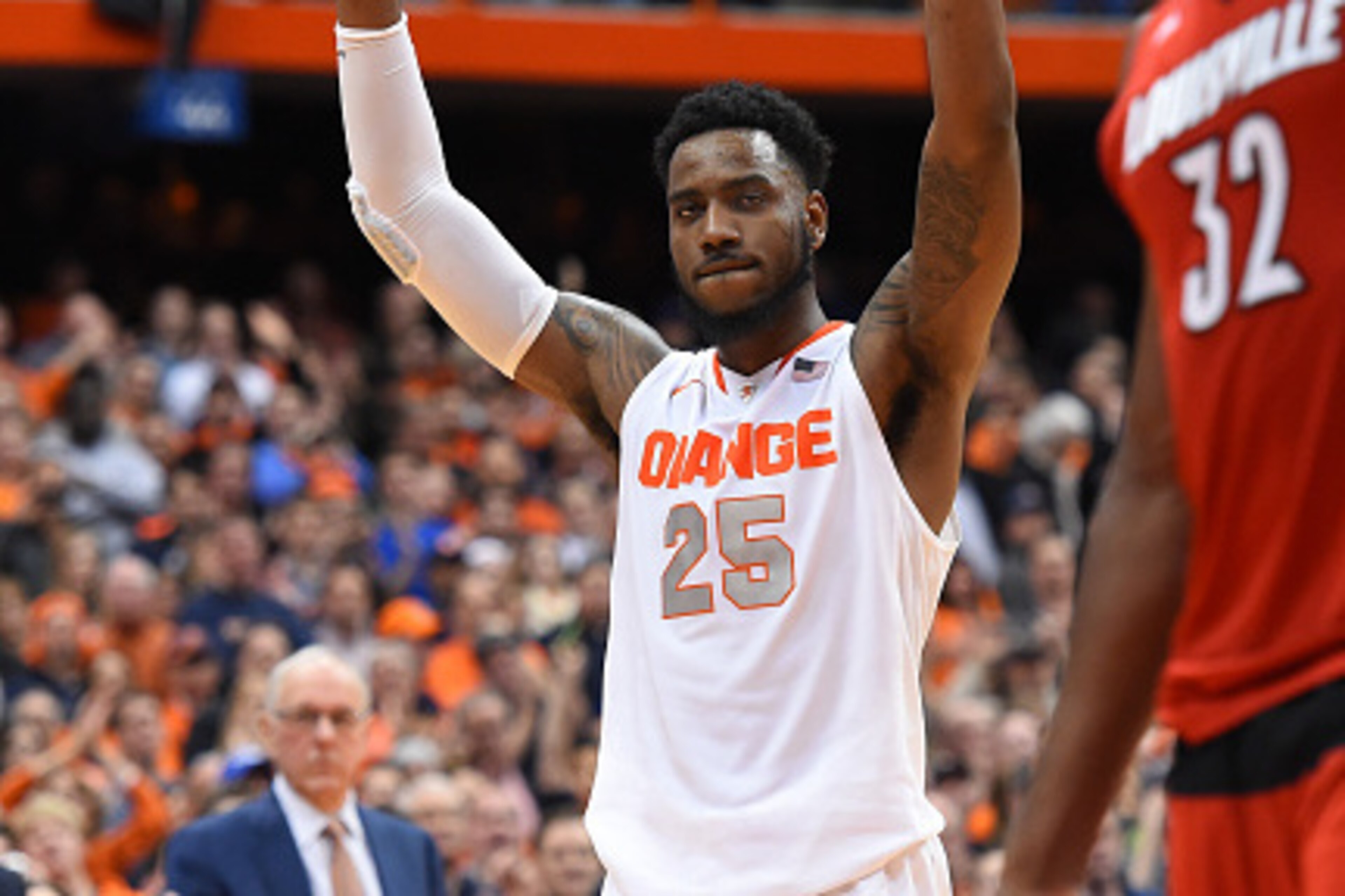 SYRACUSE, NY - FEBRUARY 18: Rakeem Christmas #25 of the Syracuse Orange celebrates in the final moments of the game against the Louisville Cardinals at the Carrier Dome on February 18, 2015 in Syracuse, New York. Syracuse defeated Louisville 69-59. (Photo