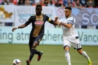 May 9, 2015; Vancouver, British Columbia, CAN; Philadelphia Union midfielder Maurice Edu (8) controls the ball against Vancouver Whitecaps midfielder Pedro Morales (77) during the second half at BC Place. The Vancouver Whitecaps won 3-0. Mandatory Credit: