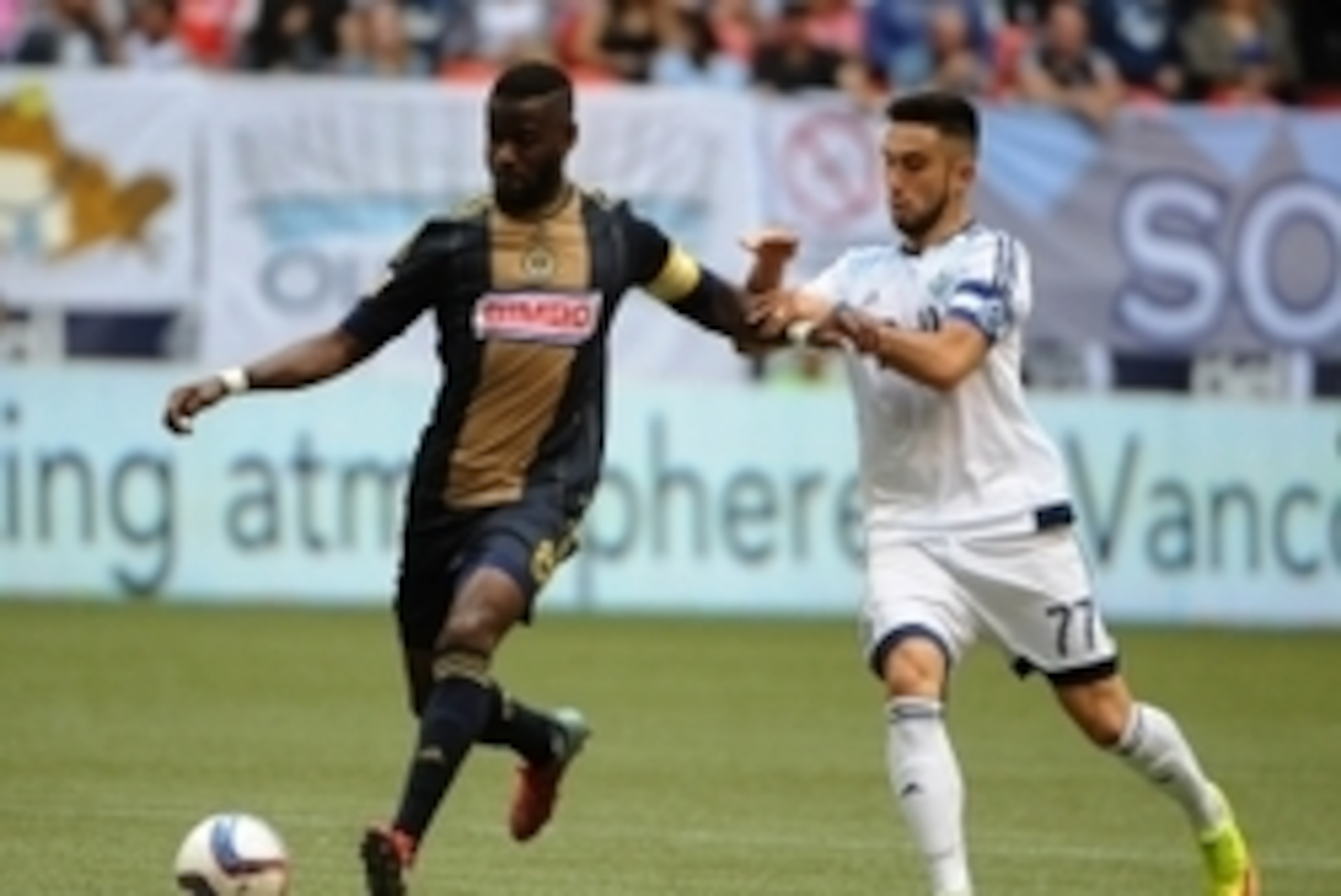 May 9, 2015; Vancouver, British Columbia, CAN; Philadelphia Union midfielder Maurice Edu (8) controls the ball against Vancouver Whitecaps midfielder Pedro Morales (77) during the second half at BC Place. The Vancouver Whitecaps won 3-0. Mandatory Credit: