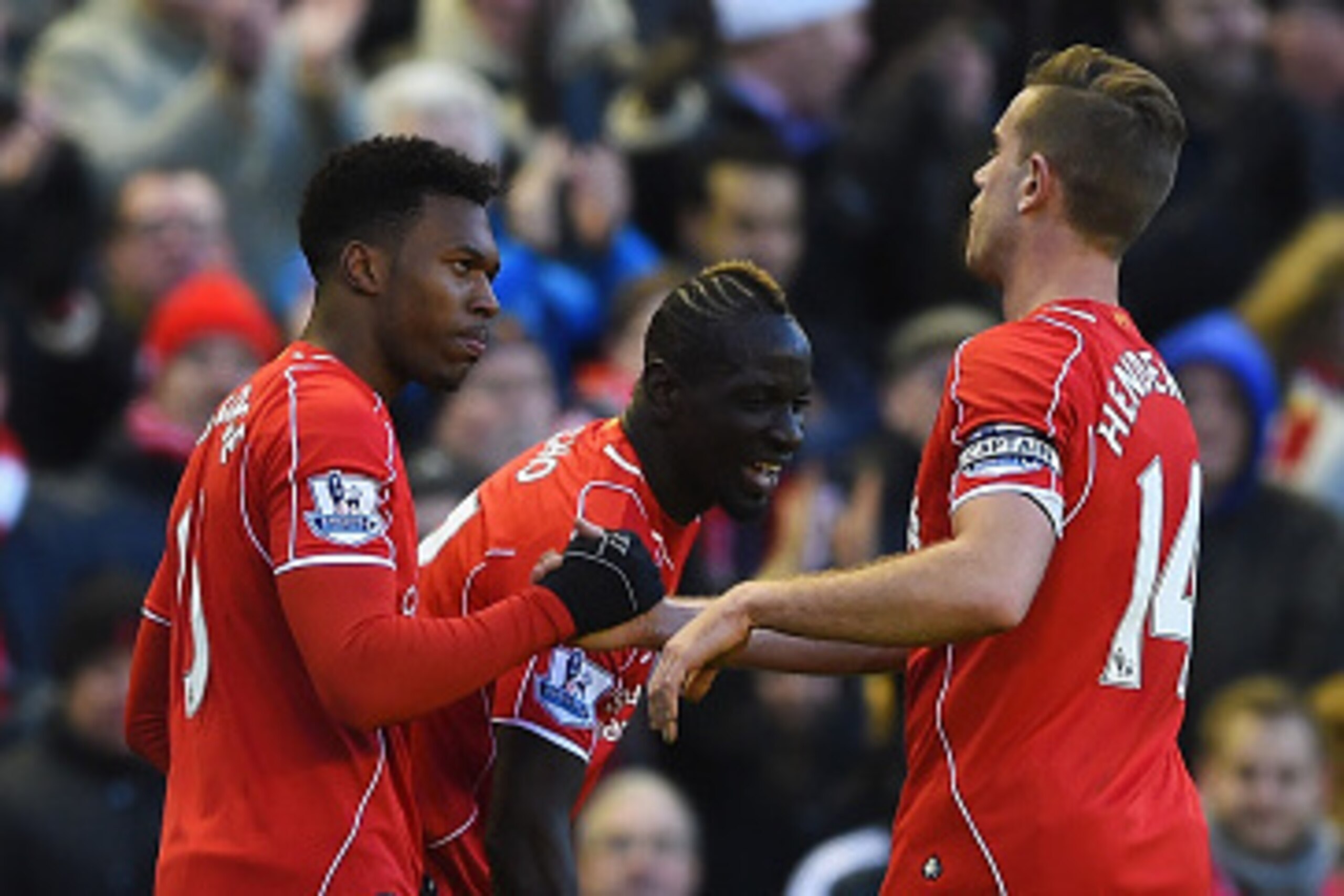 LIVERPOOL, ENGLAND - JANUARY 31:  Daniel Sturridge of Liverpool celebrates his goal with Jordan Henderson of Liverpool during the Barclays Premier League match between Liverpool and West Ham United at Anfield on January 31, 2015 in Liverpool, England.  (P