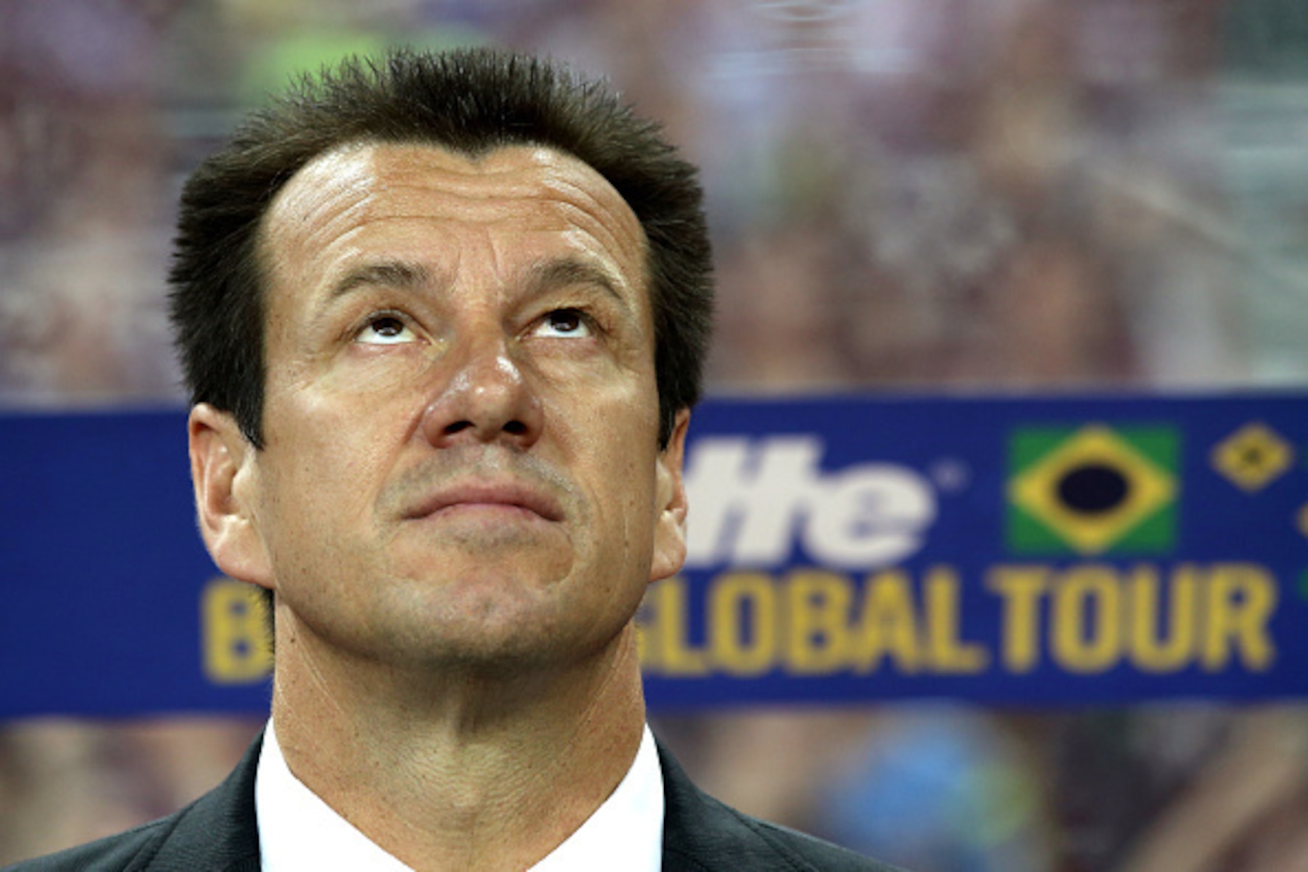 SINGAPORE - OCTOBER 14: Brazil coach, Dunga is seen on the team bench during the international friendly match between Japan and Brazil at the National Stadium on October 14, 2014 in Singapore. (Photo by Suhaimi Abdullah/Getty Images) SINGAPORE - OCTOBER 14: Brazil coach, Dunga is seen on the team bench during the international friendly match between Japan and Brazil at the National Stadium on October 14, 2014 in Singapore. (Photo by Suhaimi Abdullah/Getty Images)