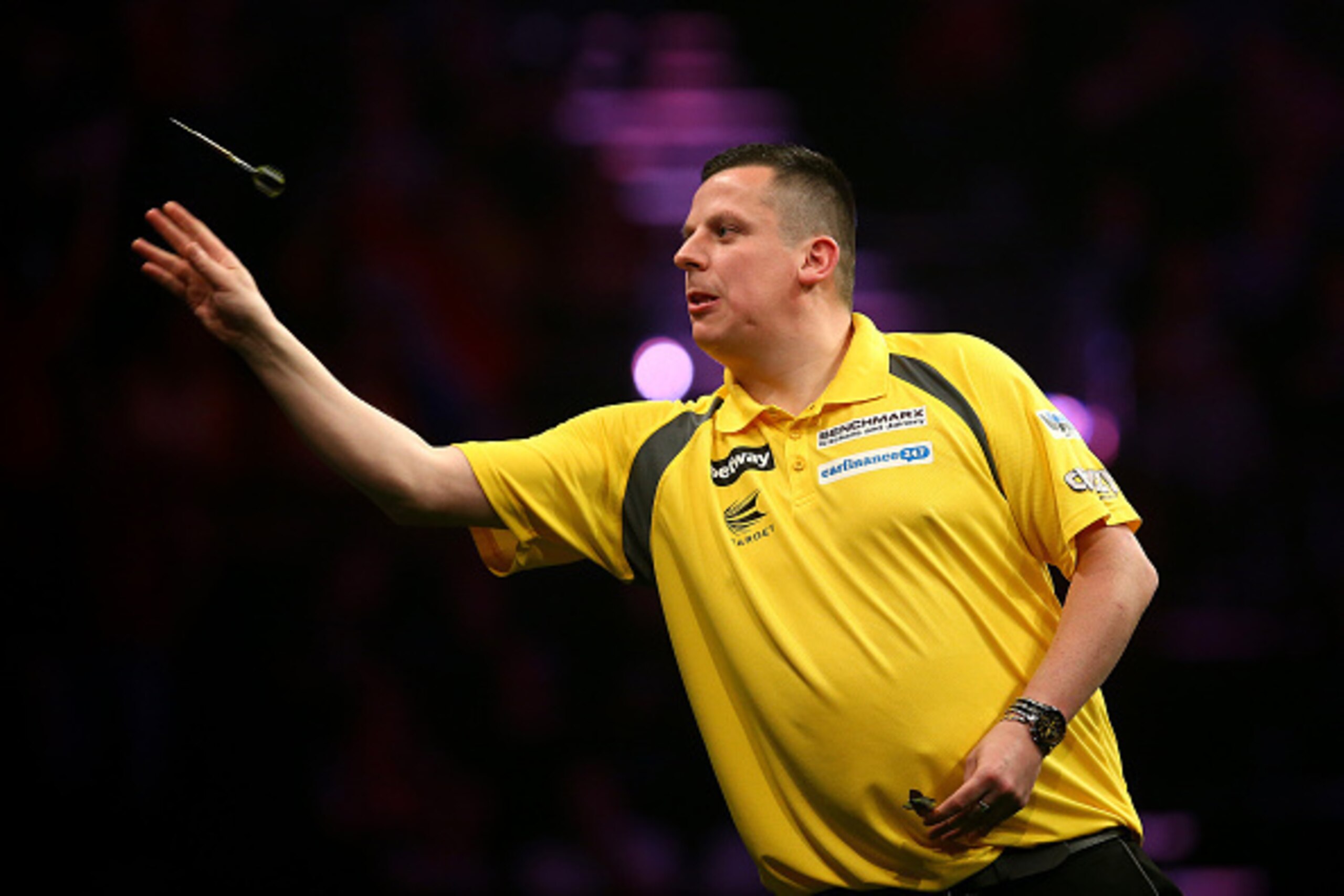 BRIGHTON, ENGLAND - MAY 14: Dave Chisnall of England in action during his match against Michael van Gerwen of Holland during the Betway Premier League at The Brighton Centre on May 14, 2015 in Brighton, England. (Photo by Charlie Crowhurst/Getty Images)