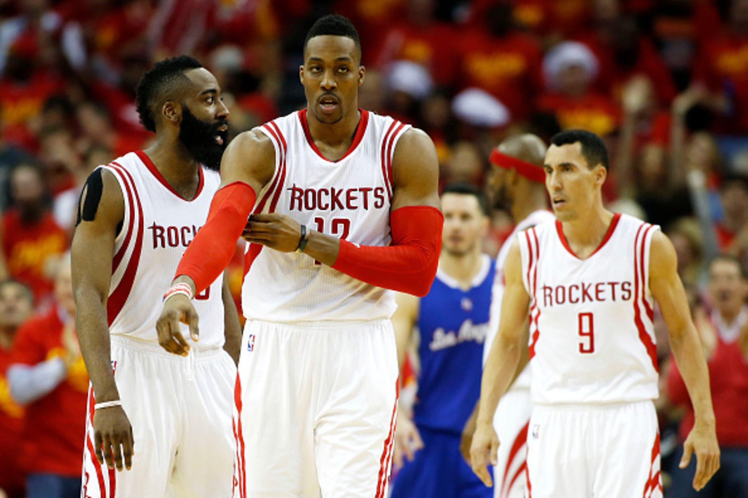 HOUSTON, TX - MAY 17:  Dwight Howard #12, James Harden #13 and Pablo Prigioni #9 of the Houston Rockets react in the fourth quarter against the Los Angeles Clippers during Game Seven of the Western Conference Semifinals at the Toyota Center for the 2015 N
