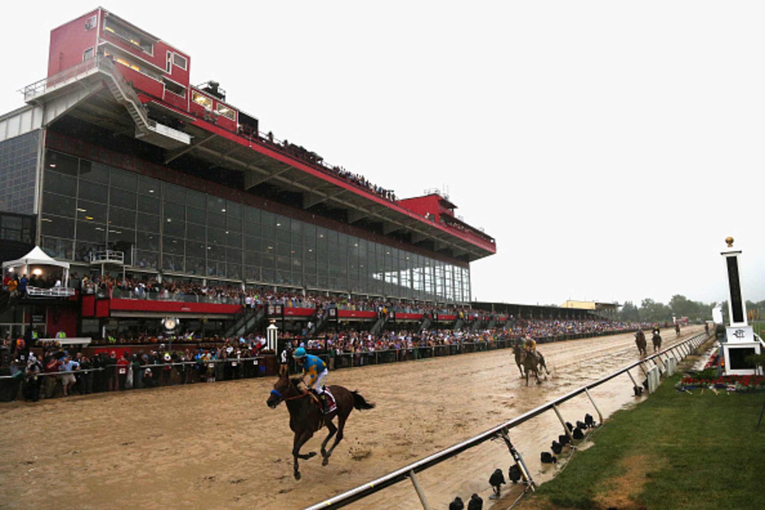 BALTIMORE, MD - MAY 16: American Pharoah #1 ridden by Victor Espinoza crosses the finish line to win the 140th running of the Preakness Stakes at Pimlico Race Course on May 16, 2015 in Baltimore, Maryland. (Photo by Patrick Smith/Getty Images) BALTIMORE, MD - MAY 16: American Pharoah #1 ridden by Victor Espinoza crosses the finish line to win the 140th running of the Preakness Stakes at Pimlico Race Course on May 16, 2015 in Baltimore, Maryland. (Photo by Patrick Smith/Getty Images)