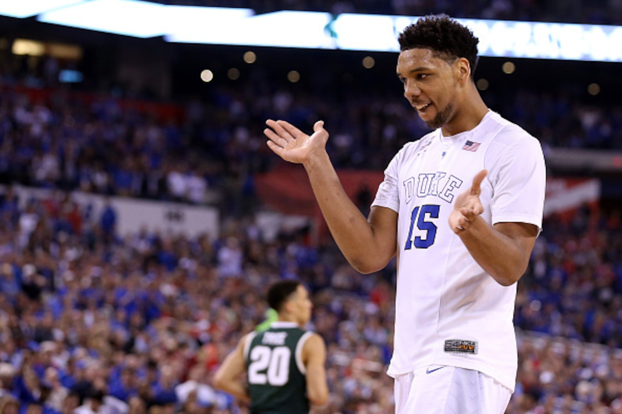 INDIANAPOLIS, IN - APRIL 04: Jahlil Okafor #15 of the Duke Blue Devils reacts after a play in the second half against the Michigan State Spartans during the NCAA Men's Final Four Semifinal at Lucas Oil Stadium on April 4, 2015 in Indianapolis, Indiana. ( INDIANAPOLIS, IN - APRIL 04: Jahlil Okafor #15 of the Duke Blue Devils reacts after a play in the second half against the Michigan State Spartans during the NCAA Men's Final Four Semifinal at Lucas Oil Stadium on April 4, 2015 in Indianapolis, Indiana. (