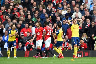 MANCHESTER, ENGLAND - MAY 17:  Olivier Giroud of Arsenal reacts after a missed chance during the Barclays Premier League match between Manchester United and Arsenal at Old Trafford on May 17, 2015 in Manchester, England.  (Photo by Shaun Botterill/Getty I