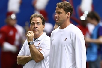 NEW ORLEANS, LA - JANUARY 01:  Head coach Nick Saban of the Alabama Crimson Tide looks on with  Lane Kiffin Offensive Coordinator on the field prior to the All State Sugar Bowl against the Ohio State Buckeyes at the Mercedes-Benz Superdome on January 1, 2