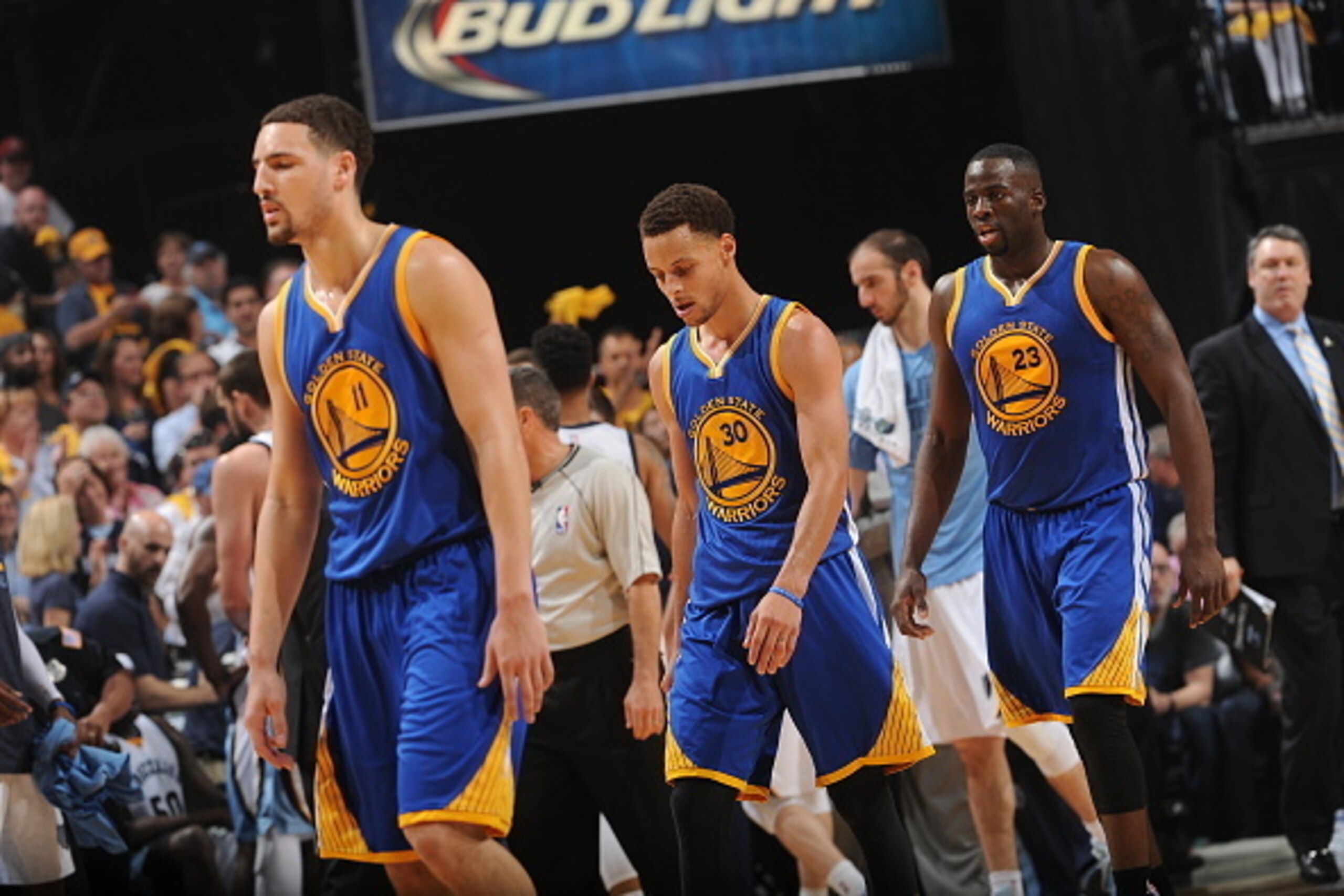 MEMPHIS, TN - MAY 9:  Klay Thompson #11, Stephen Curry #30, and Draymond Green #23 of the Golden State Warriors against the Memphis Grizzlies in Game Three of the Western Conference Semifinals during the 2015 NBA Playoffs on May 9, 2015 at the FedExForum 