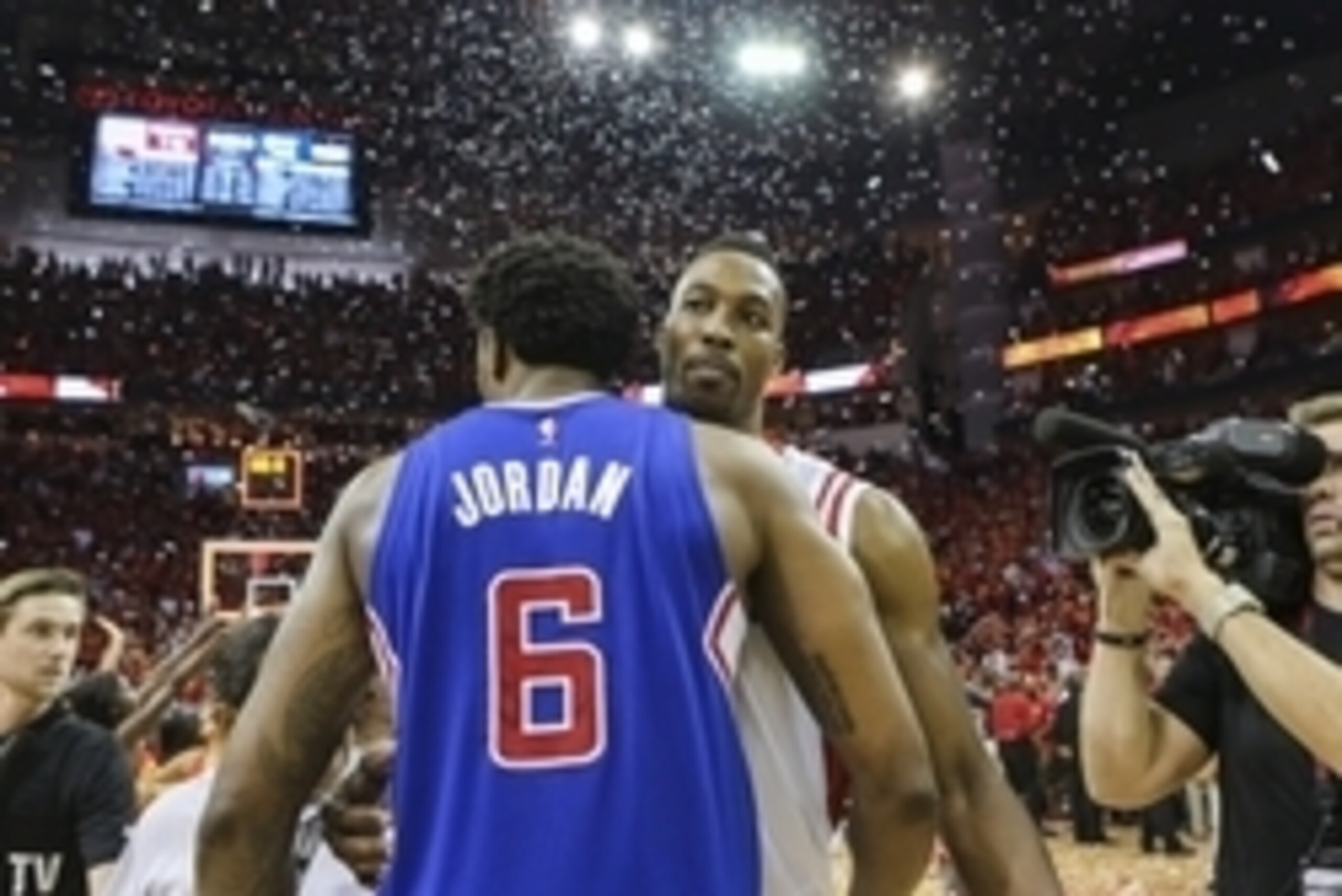 May 17, 2015; Houston, TX, USA; Houston Rockets center Dwight Howard (12) greets Los Angeles Clippers center DeAndre Jordan (6) after the Rockets defeated the Clippers 113-100 in game seven of the second round of the NBA Playoffs at Toyota Center. The Roc