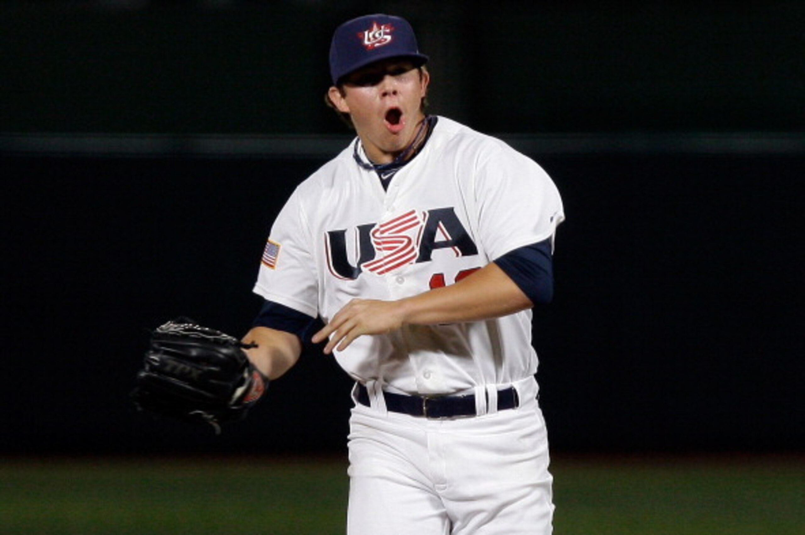 SEOUL, SOUTH KOREA - SEPTEMBER 08:  Keegan Thompson of United States celebrates after winning the U18 Baseball World Championship final match between USA and Canada at Mokdong stadium on September 8, 2012 in Seoul, South Korea.  (Photo by Chung Sung-Jun/G