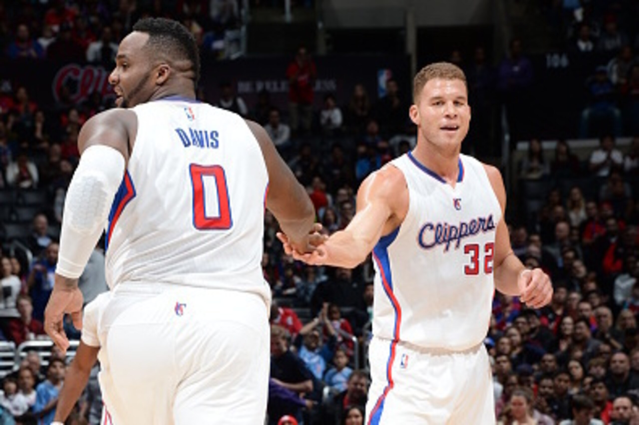 LOS ANGELES, CA - DECEMBER 27: Glen Davis #0 and Blake Griffin #32 of the Los Angeles Clippers slap hands during the game against the Toronto Raptors on December 27, 2014 at STAPLES Center in Los Angeles, California. NOTE TO USER: User expressly acknowled