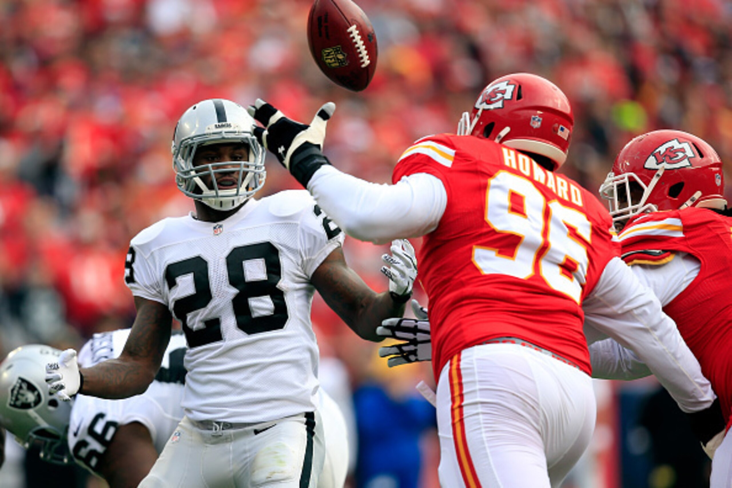 KANSAS CITY, MO - DECEMBER 14: Jaye Howard #96 of the Kansas City Chiefs breaks up a pass intended for Latavius Murray #28 of the Oakland Raiders during the game at Arrowhead Stadium on December 14, 2014 in Kansas City, Missouri. (Photo by Jamie Squir KANSAS CITY, MO - DECEMBER 14: Jaye Howard #96 of the Kansas City Chiefs breaks up a pass intended for Latavius Murray #28 of the Oakland Raiders during the game at Arrowhead Stadium on December 14, 2014 in Kansas City, Missouri. (Photo by Jamie Squir
