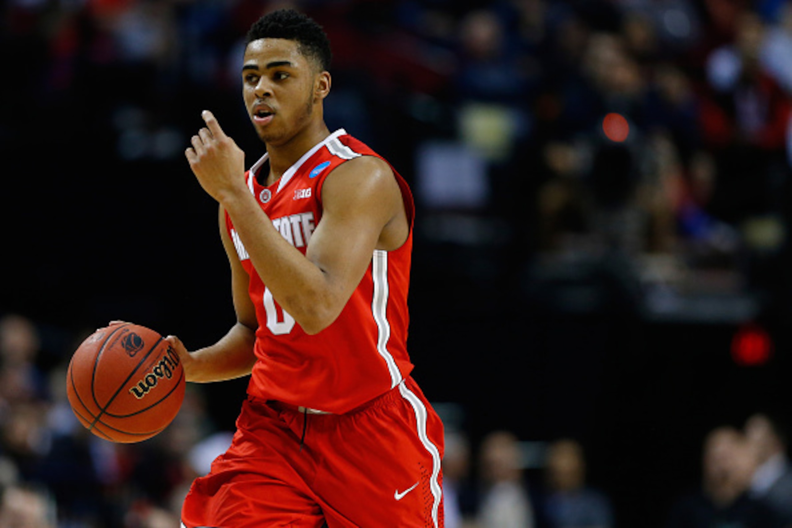 PORTLAND, OR - MARCH 19: D'Angelo Russell #0 of the Ohio State Buckeyes dribbles up the court against the Virginia Commonwealth Rams in the first half during the second round of the 2015 NCAA Men's Basketball Tournament at Moda Center on March 19, 2015 i PORTLAND, OR - MARCH 19: D'Angelo Russell #0 of the Ohio State Buckeyes dribbles up the court against the Virginia Commonwealth Rams in the first half during the second round of the 2015 NCAA Men's Basketball Tournament at Moda Center on March 19, 2015 i