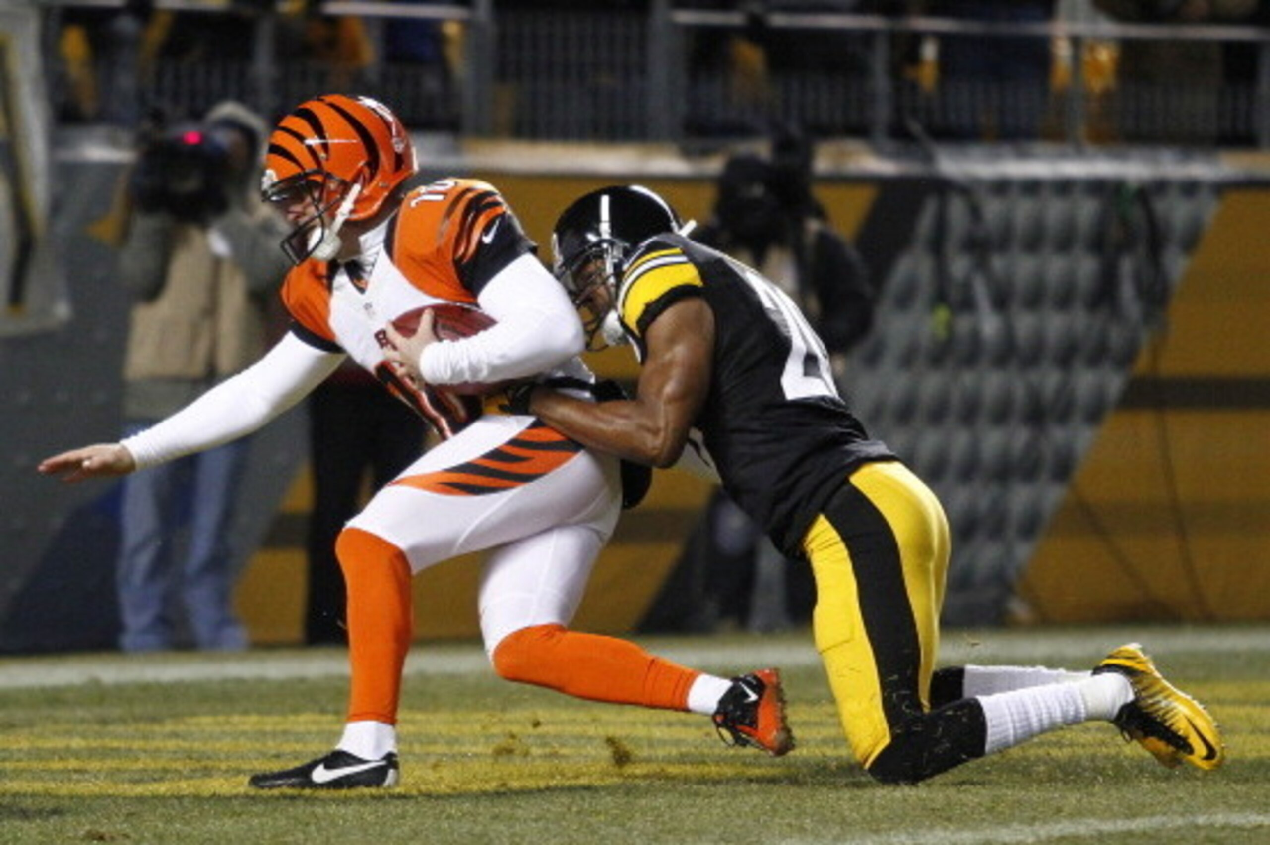 PITTSBURGH, PA - DECEMBER 15:  Will Allen #20 of the Pittsburgh Steelers tackles Kevin Huber #10 of the Cincinnati Bengals during the game on December 15, 2013 at Heinz Field in Pittsburgh, Pennsylvania.  (Photo by Justin K. Aller/Getty Images)