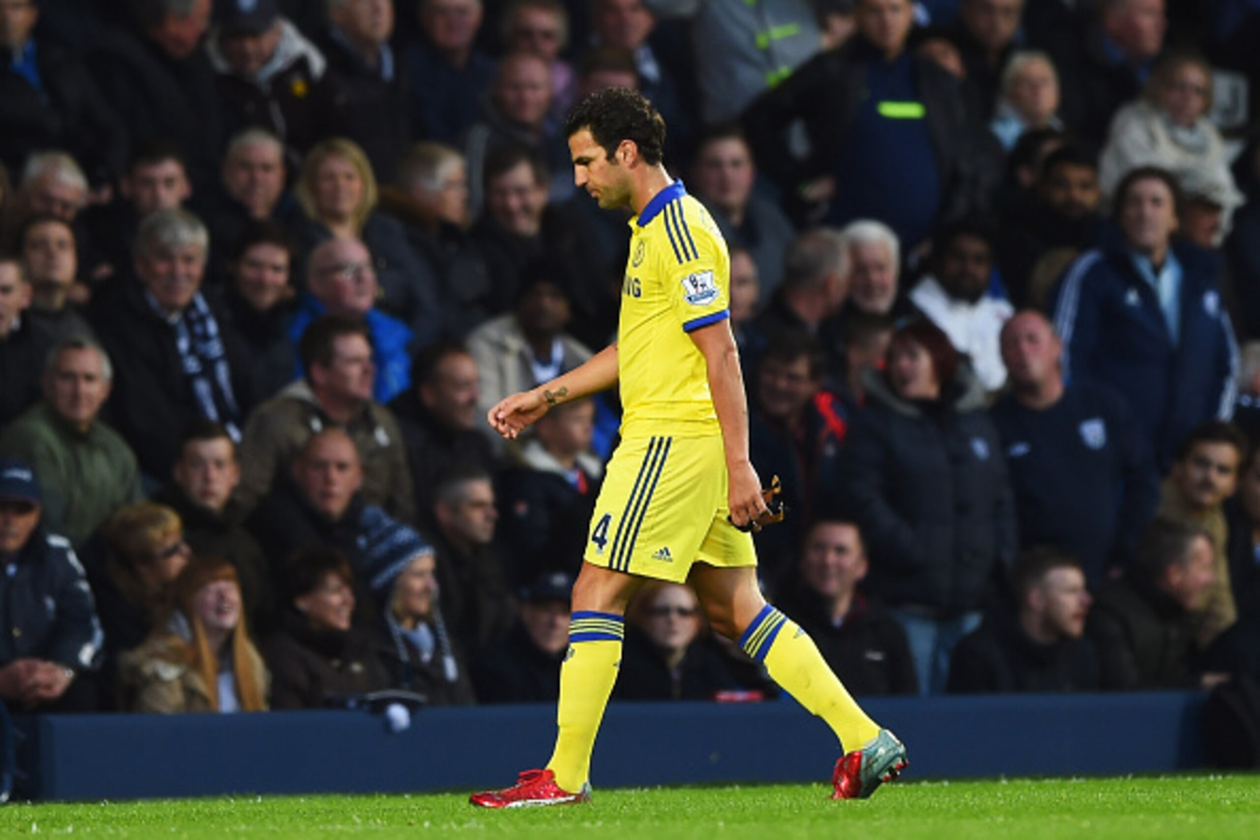WEST BROMWICH, ENGLAND - MAY 18:  Cesc Fabregas of Chelsea leaves the pitch as he is sent off during the Barclays Premier League match between West Bromwich Albion and Chelsea at The Hawthorns on May 18, 2015 in West Bromwich, England.  (Photo by Shaun Bo