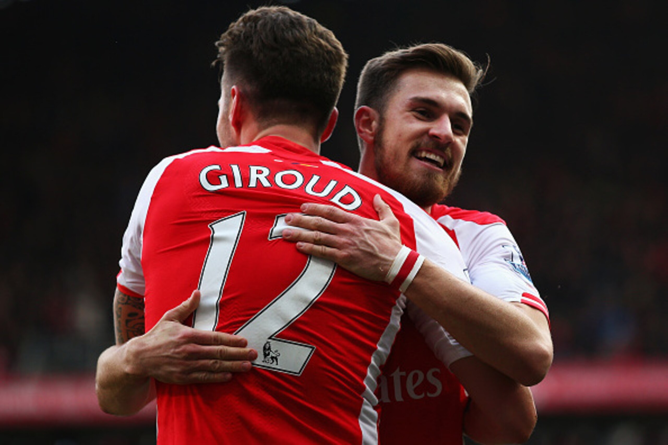 LONDON, ENGLAND - MARCH 14: Aaron Ramsey of Arsenal celebrates his goal with Olivier Giroud of Arsenal during the Barclays Premier League match between Arsenal and West Ham United at Emirates Stadium on March 14, 2015 in London, England.  (Photo by Ian Wa