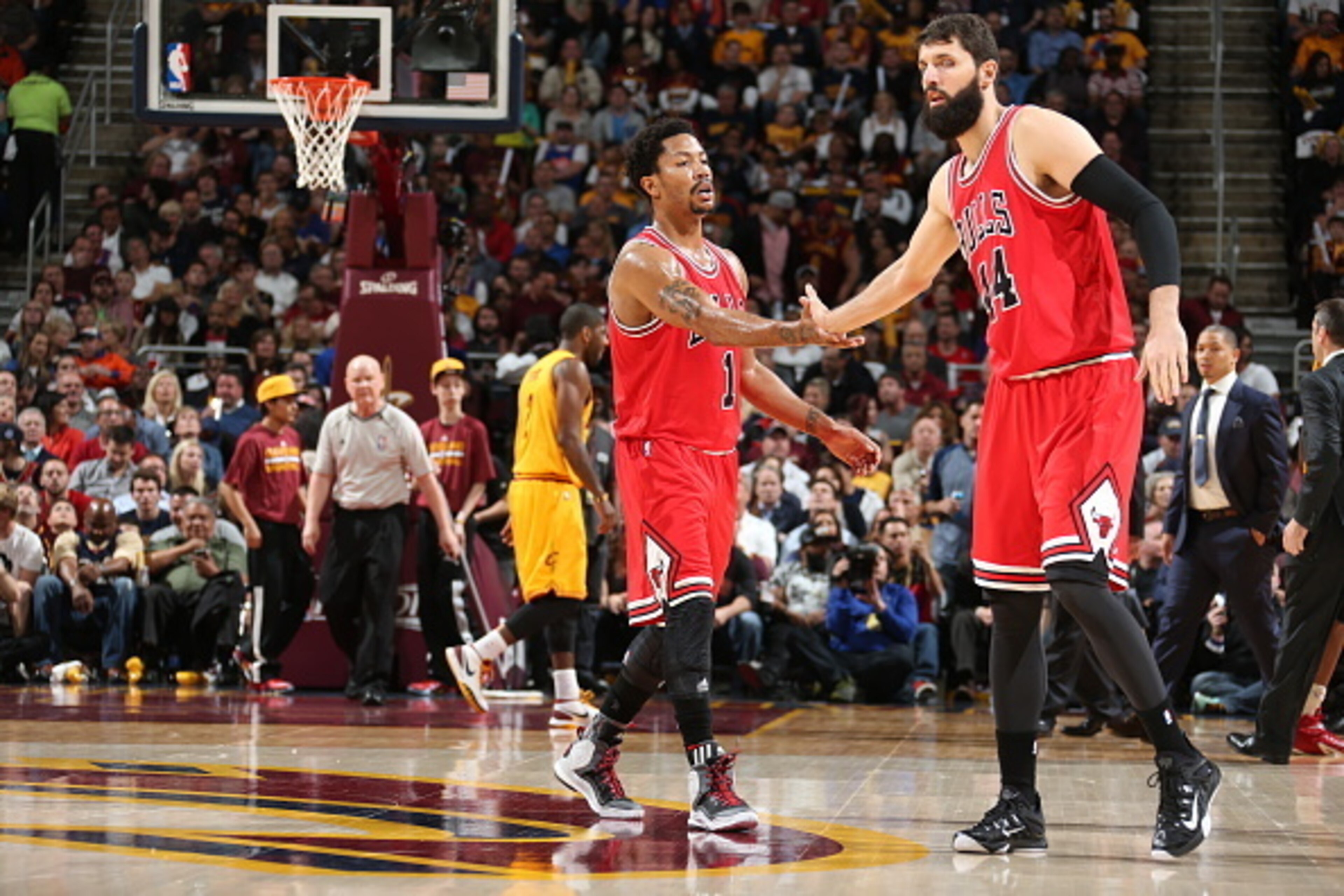 CLEVELAND, OH - MAY 12: Derrick Rose #1 and Nikola Mirotic #44 of the Chicago Bulls during the game against the Cleveland Cavaliers in Game Five of the Eastern Conference Semifinals of the NBA Playoffs at The Quicken Loans Arena on May 12, 2015 in Clevela