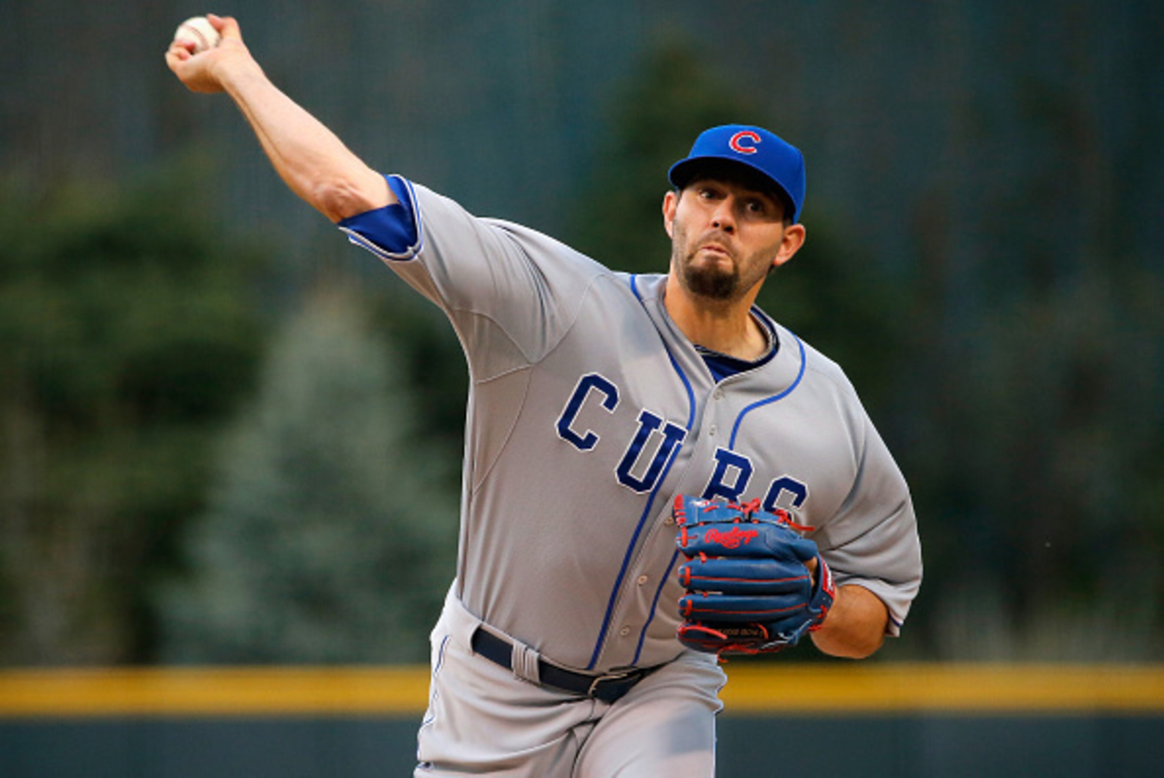 DENVER, CO - APRIL 11:  Starting pitcher Jason Hammel #39 of the Chicago Cubs delivers against the Colorado Rockies at Coors Field on April 11, 2015 in Denver, Colorado.  (Photo by Doug Pensinger/Getty Images)