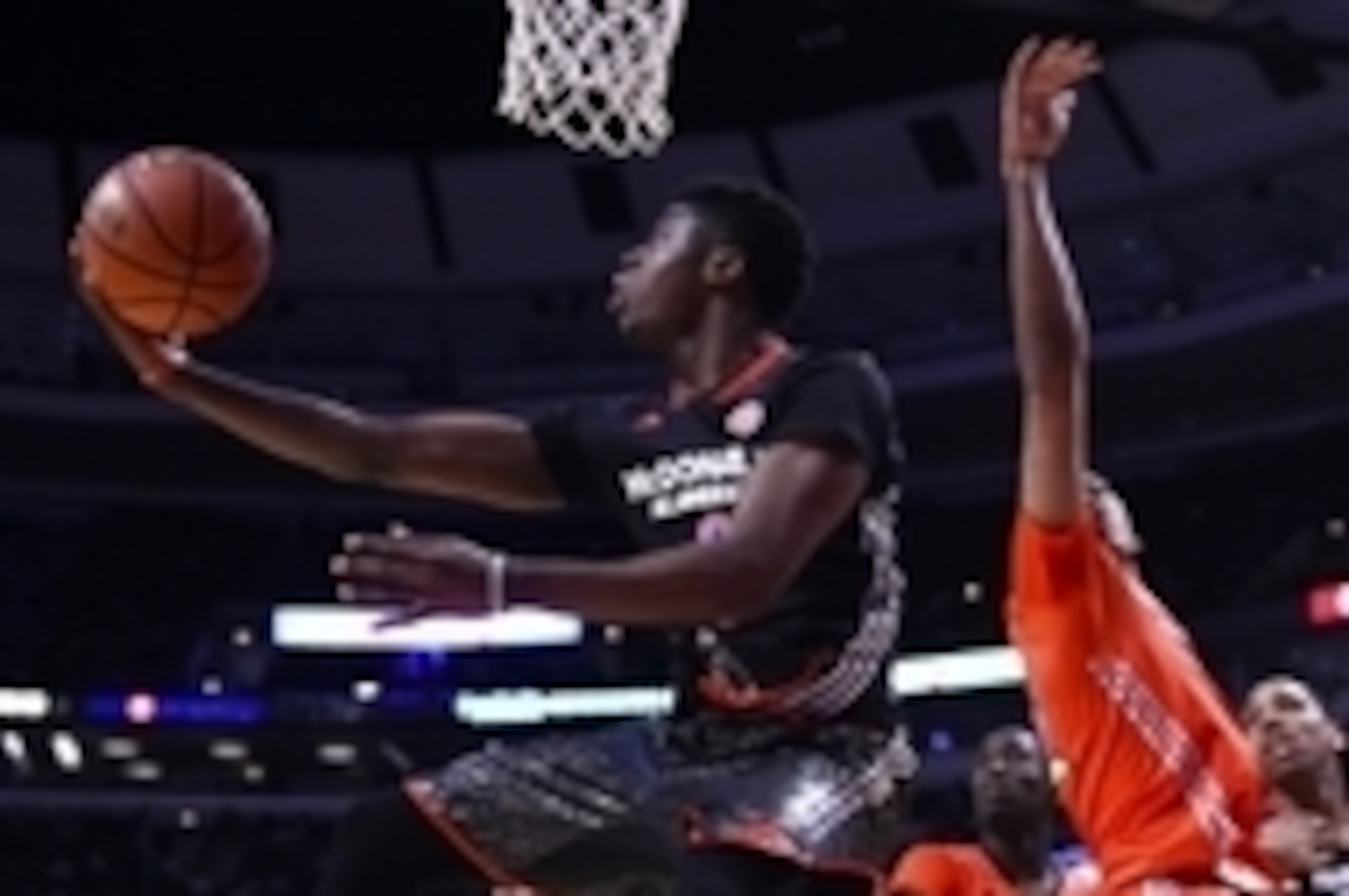Apr 2, 2014; Chicago, IL, USA; McDonald's All American West guard Emmanuel Mudiay (0) shoots the ball against McDonald's All American East center Myles Turner (35) during the second half at the United Center. The West defeats the East 105-102. Mandatory C Apr 2, 2014; Chicago, IL, USA; McDonald's All American West guard Emmanuel Mudiay (0) shoots the ball against McDonald's All American East center Myles Turner (35) during the second half at the United Center. The West defeats the East 105-102. Mandatory C