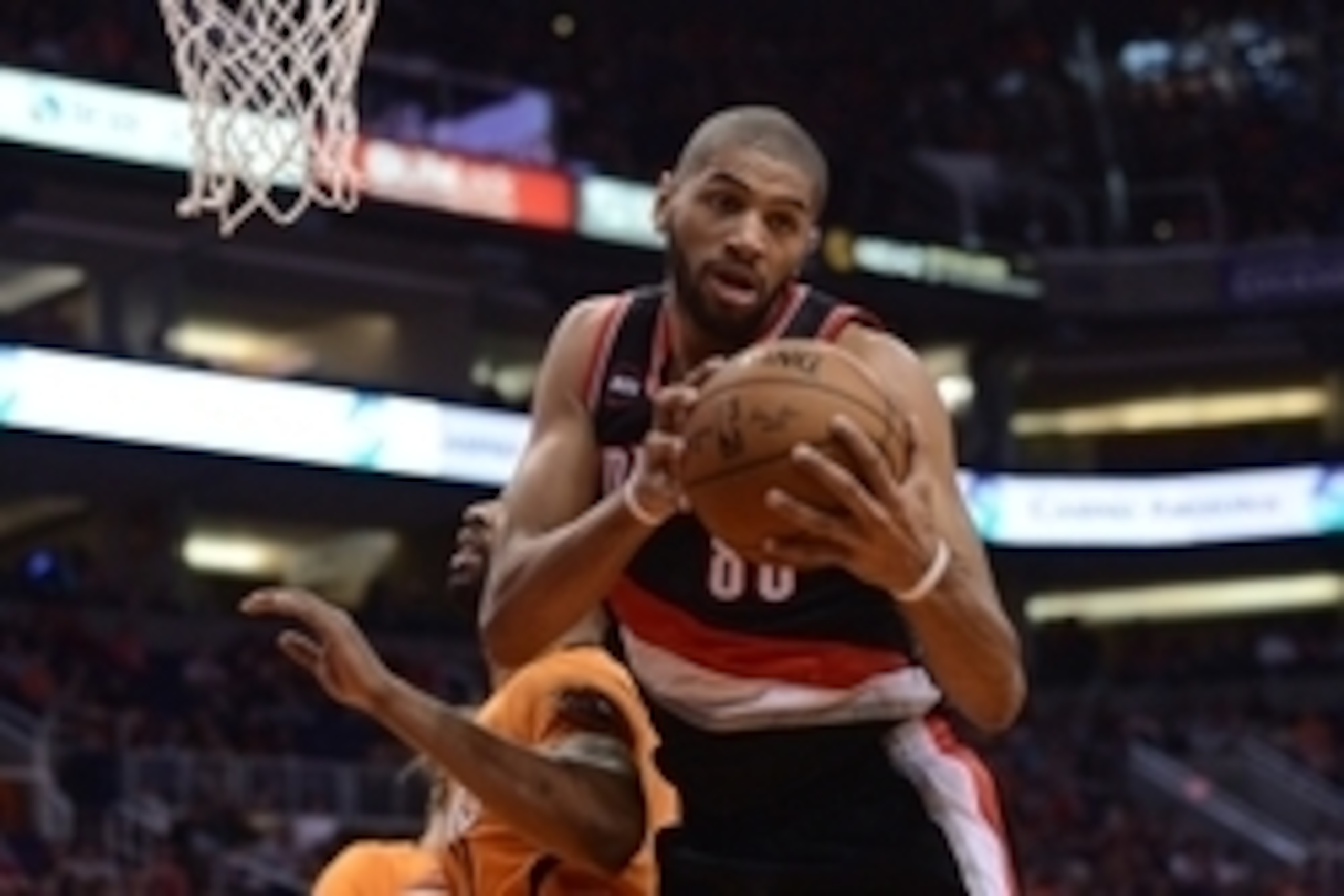 Mar 27, 2015; Phoenix, AZ, USA; Portland Trail Blazers forward Nicolas Batum (88) grabs a rebound against the Phoenix Suns at US Airways Center. The Trail Blazers won the game 87-81. Mandatory Credit: Joe Camporeale-USA TODAY Sports