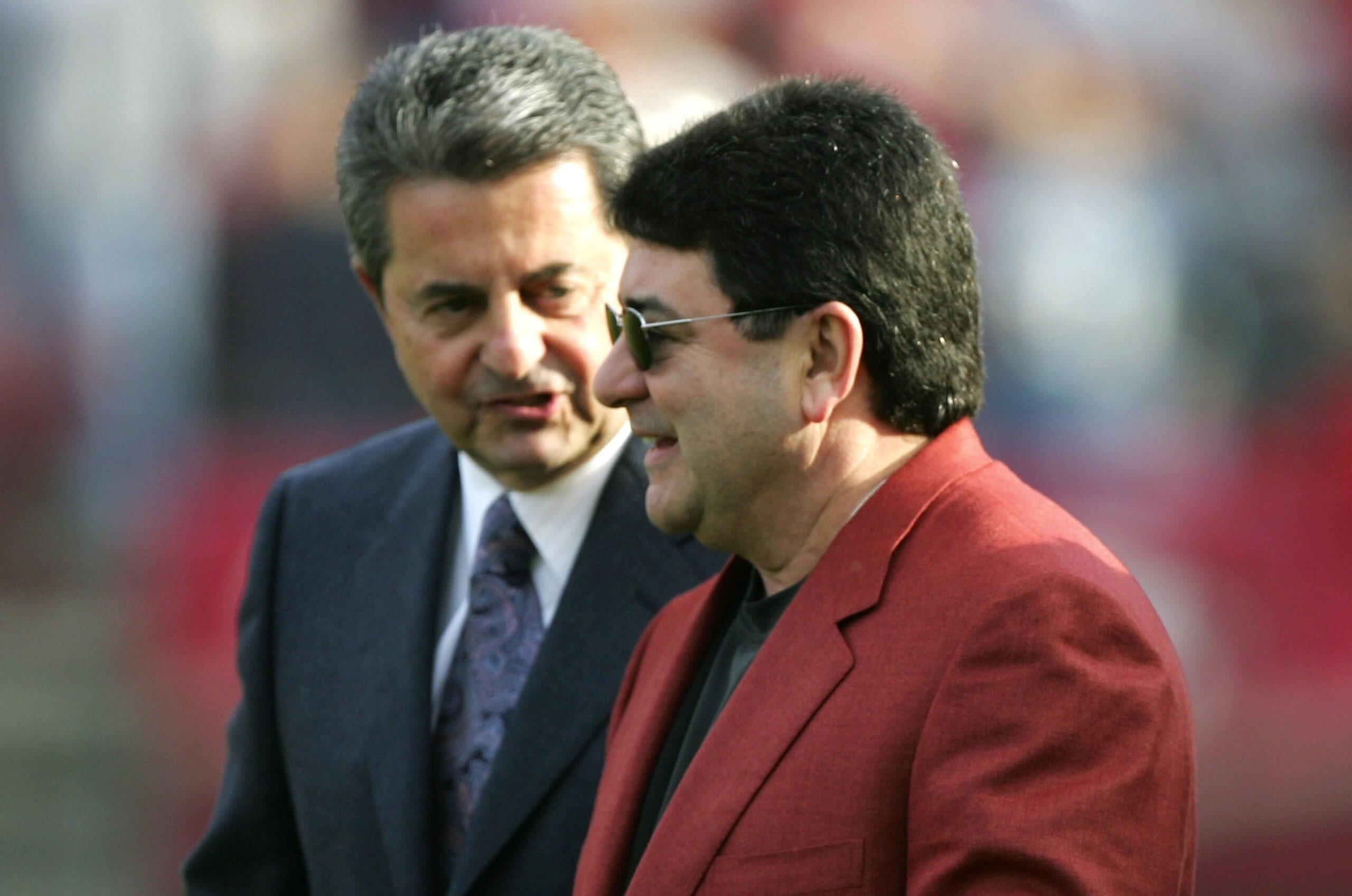 SAN FRANCISCO - NOVEMBER 19: Former president of the 49ers, Carmen Policy, and former owner, Eddie DeBartolo Jr., walk to the ceremony held in Jerry Rice's honor during half time of the NFL game between the San Francisco 49ers and the Seattle Seahawks at SAN FRANCISCO - NOVEMBER 19: Former president of the 49ers, Carmen Policy, and former owner, Eddie DeBartolo Jr., walk to the ceremony held in Jerry Rice's honor during half time of the NFL game between the San Francisco 49ers and the Seattle Seahawks at