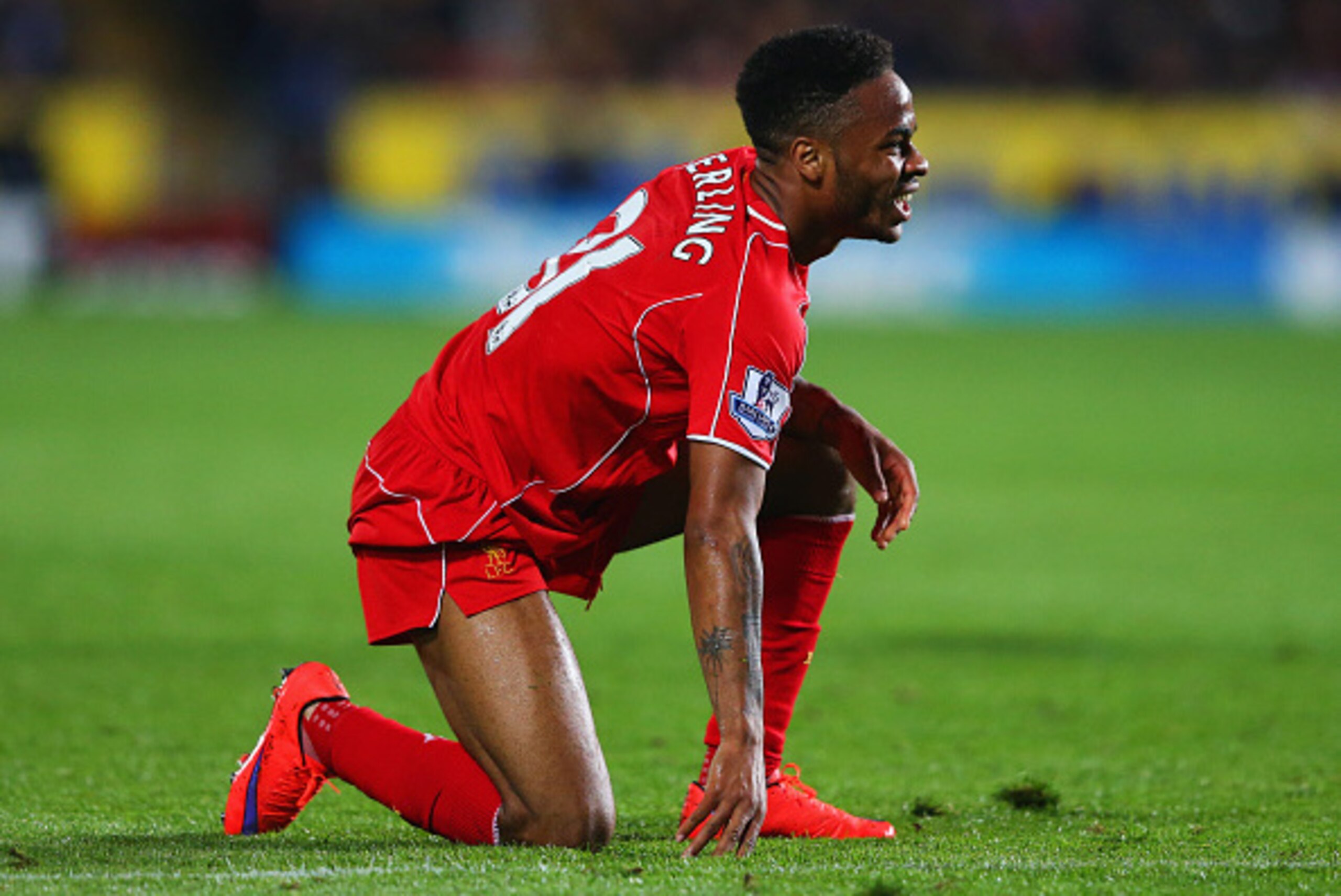 HULL, ENGLAND - APRIL 28:  Raheem Sterling of Liverpool kneels on the turf during the Barclays Premier League match between Hull City and Liverpool at KC Stadium on April 28, 2015 in Hull, England.  (Photo by Alex Livesey/Getty Images)