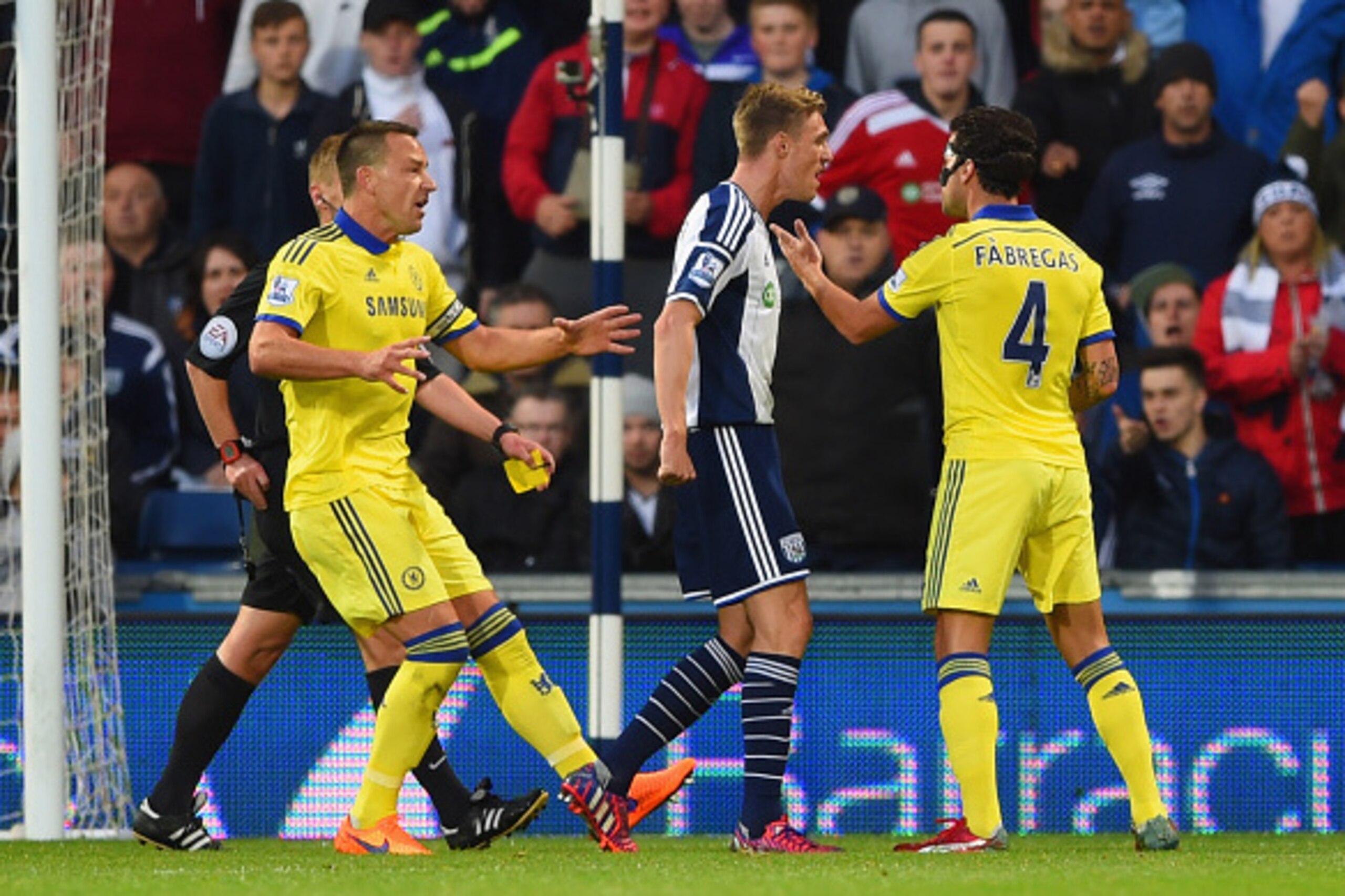 WEST BROMWICH, ENGLAND - MAY 18:  Cesc Fabregas of Chelsea (R) and Darren Fletcher of West Bromwich Albion clash prior to Fabregas being sent off during the Barclays Premier League match between West Bromwich Albion and Chelsea at The Hawthorns on May 18,