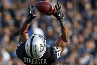 OAKLAND, CA - OCTOBER 21: Wide receiver Rod Streater #80 of the Oakland Raiders catches a pass over cornerback Derek Cox #21 of the Jacksonville Jaguars during the fourth quarter at O.co Coliseum on October 21, 2012 in Oakland, California. The Oakland Rai