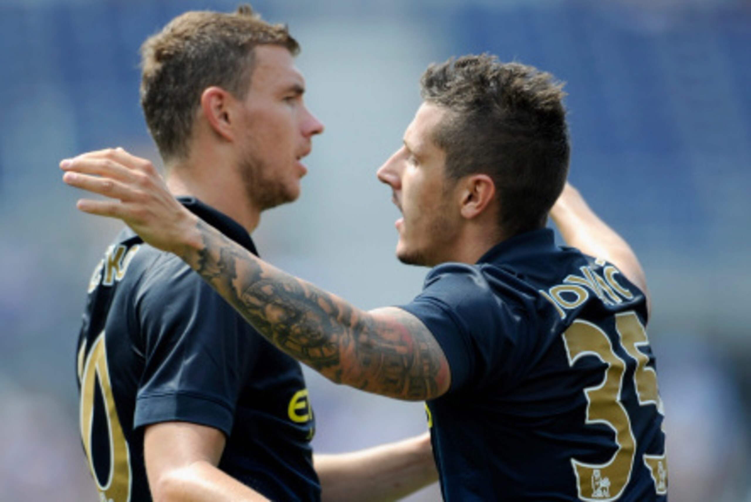 MINNEAPOLIS, MN - AUGUST 2: Edin Dzeko #10 and Stevan Jovetic #35 of Manchester City celebrate a goal by Jovetic during the first half of the International Champions Cup match against the Olympiacos on August 2, 2014 at TCF Bank Stadium in Minneapolis, Mi MINNEAPOLIS, MN - AUGUST 2: Edin Dzeko #10 and Stevan Jovetic #35 of Manchester City celebrate a goal by Jovetic during the first half of the International Champions Cup match against the Olympiacos on August 2, 2014 at TCF Bank Stadium in Minneapolis, Mi