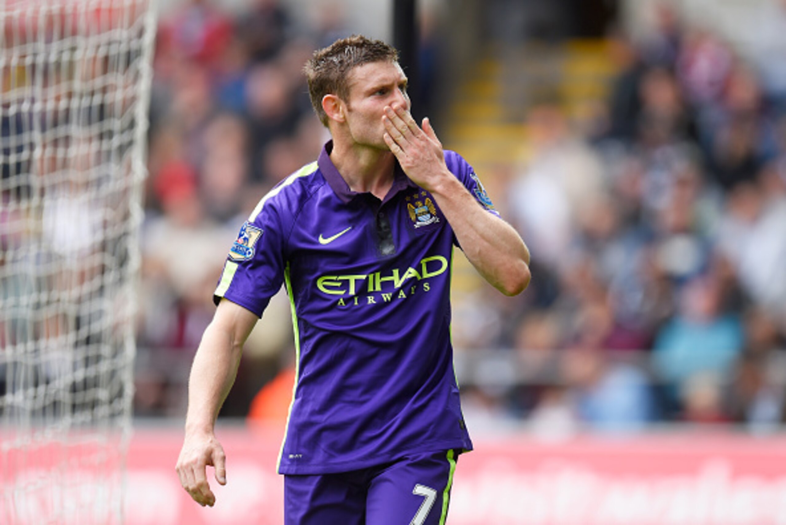 SWANSEA, WALES - MAY 17:  James Milner of Manchester City celebrates after scoring his team's second goal during the Barclays Premier League match between Swansea and Manchester City at the Liberty Stadium on May 17, 2015 in Swansea, Wales.  (Photo by Stu