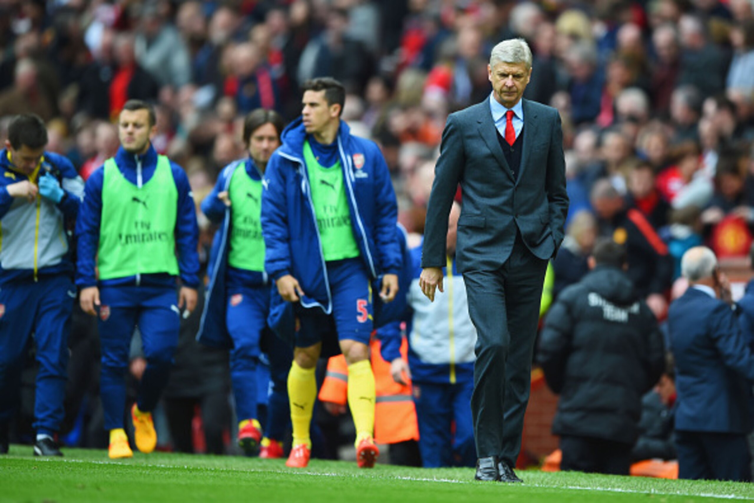 MANCHESTER, ENGLAND - MAY 17:  Arsene Wenger manager of Arsenal looks on at half time during the Barclays Premier League match between Manchester United and Arsenal at Old Trafford on May 17, 2015 in Manchester, England.  (Photo by Shaun Botterill/Getty I