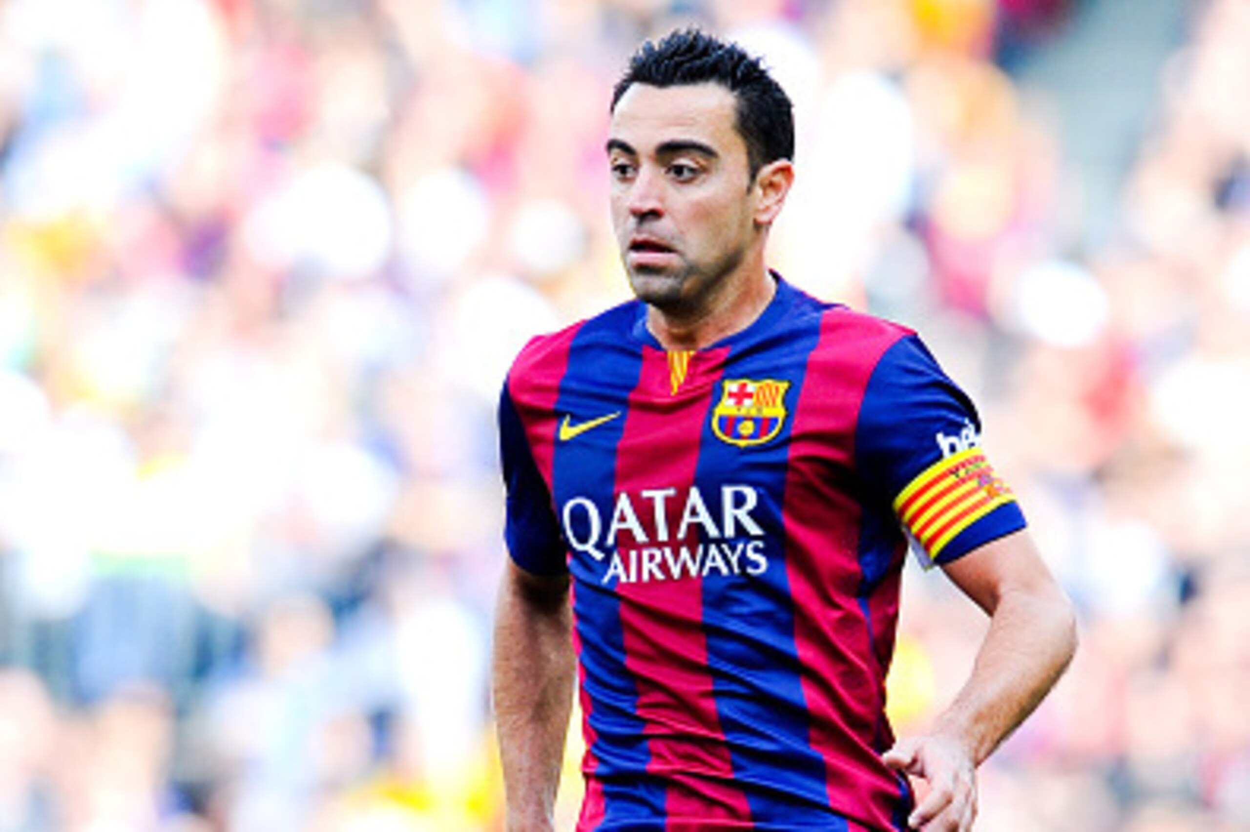 BARCELONA, SPAIN - APRIL 18: Xavi Hernandez of FC Barcelona runs with the ball during the La Liga match between FC Barcelona and Valencia CF at Camp Nou on April 18, 2015 in Barcelona, Spain. (Photo by David Ramos/Getty Images) BARCELONA, SPAIN - APRIL 18: Xavi Hernandez of FC Barcelona runs with the ball during the La Liga match between FC Barcelona and Valencia CF at Camp Nou on April 18, 2015 in Barcelona, Spain. (Photo by David Ramos/Getty Images)