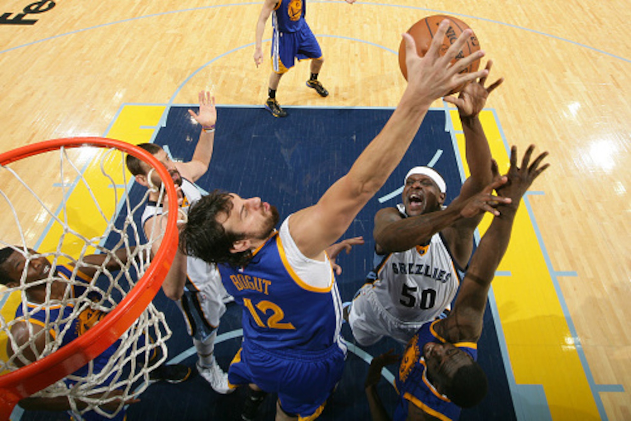 MEMPHIS, TN - MAY 15: Zach Randolph #50 of the Memphis Grizzlies' shoots against Andrew Bogut #12 of the Golden State Warriors in Game Six of the Western Conference Semifinals of the NBA Playoffs at FedExForum on May 15, 2015 in Memphis, Tennessee. NOTE T