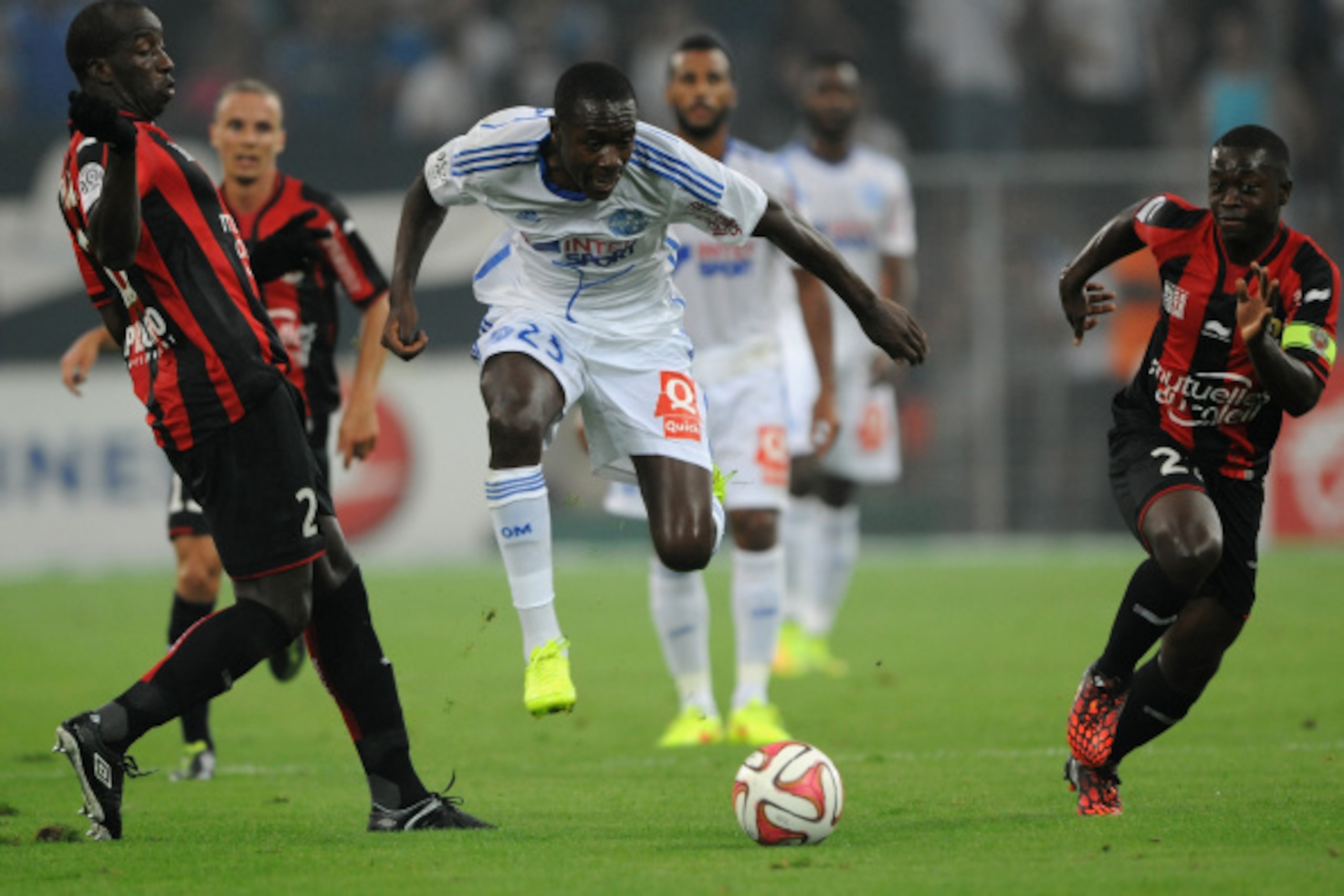 MARSEILLE, FRANCE - AUGUST 29:  Giannelli Imbula (C) of Marseille in action during the French Ligue 1 match between Olympique de Marseille and OGC Nice at Stade Velodrome on August 29, 2014 in Marseille, France.  (Photo by Kaz Photography/Getty Images)