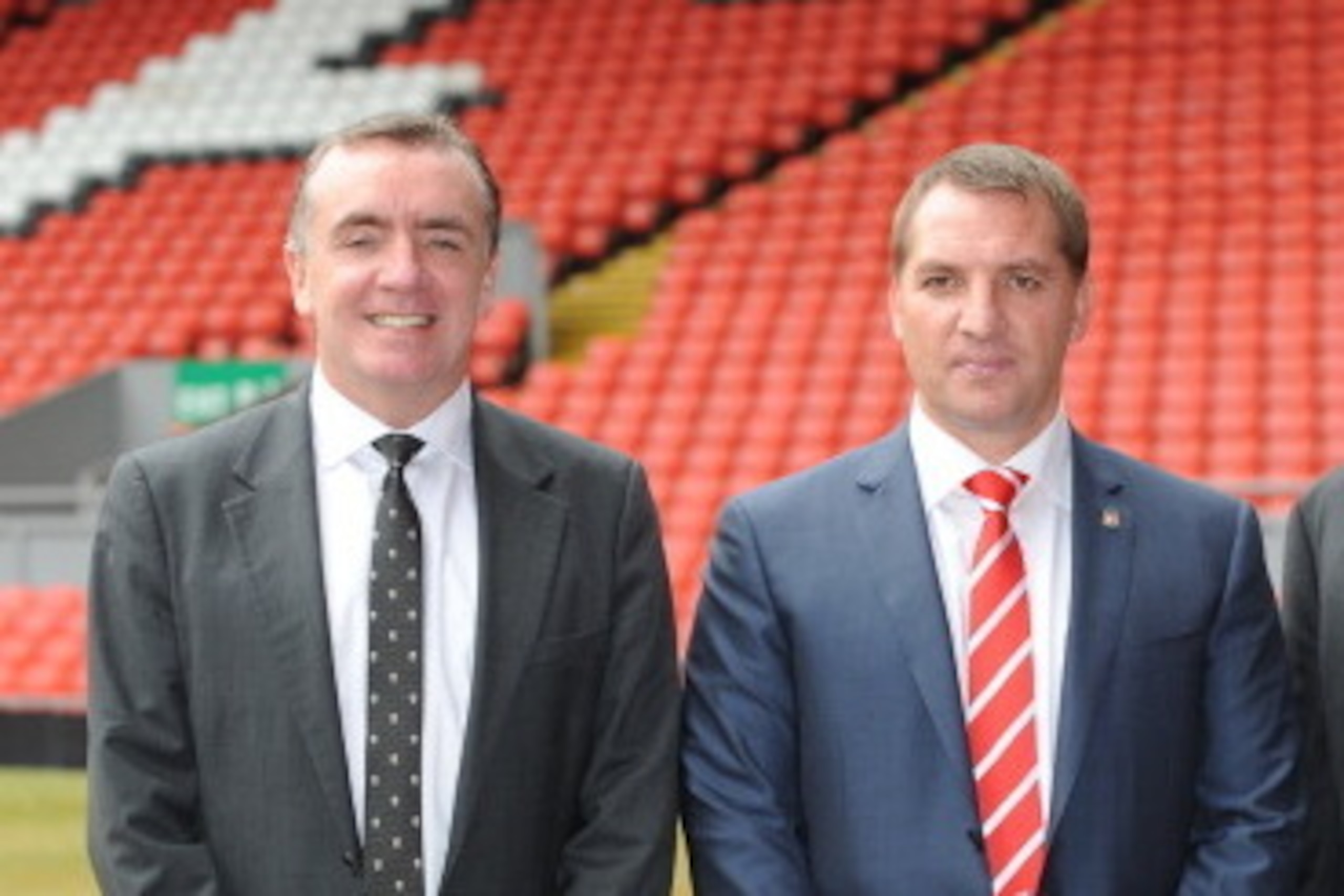 LIVERPOOL, UNITED KINGDOM - JUNE 01: Brendan Rodgers (C) is unveiled as the new Liverpool FC manager by Managing Director Ian Ayre (L) and Chaiman Tom Werner (R) at a press conference at Anfield on June 01, 2012 in Liverpool, England. (Photo by Clint Hug LIVERPOOL, UNITED KINGDOM - JUNE 01: Brendan Rodgers (C) is unveiled as the new Liverpool FC manager by Managing Director Ian Ayre (L) and Chaiman Tom Werner (R) at a press conference at Anfield on June 01, 2012 in Liverpool, England. (Photo by Clint Hug