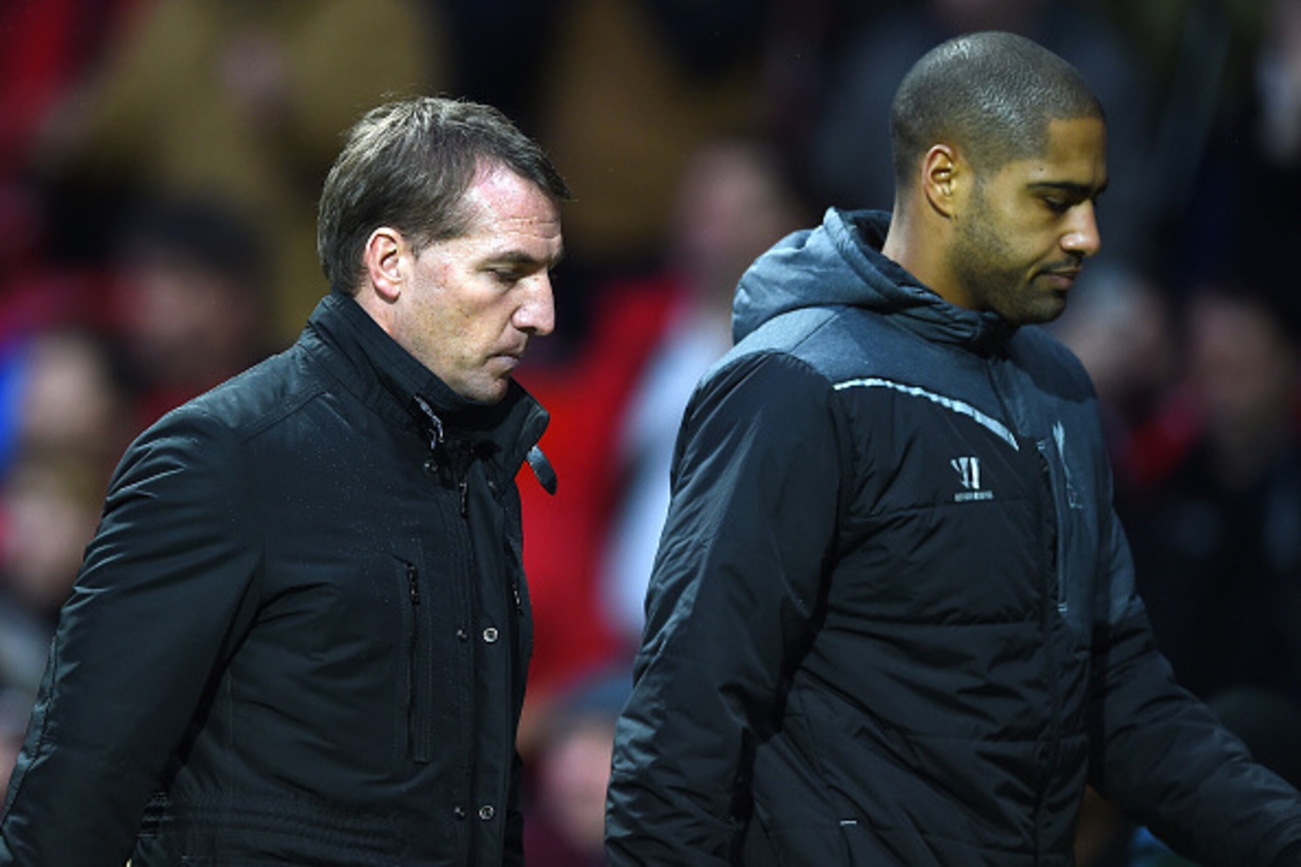 MANCHESTER, ENGLAND - DECEMBER 14: Liverpool Manager Brendan Rodgers walks off with Glen Johnson at the end of the Barclays Premier League match between Manchester United and Liverpool at Old Trafford on December 14, 2014 in Manchester, England. (Photo MANCHESTER, ENGLAND - DECEMBER 14: Liverpool Manager Brendan Rodgers walks off with Glen Johnson at the end of the Barclays Premier League match between Manchester United and Liverpool at Old Trafford on December 14, 2014 in Manchester, England. (Photo