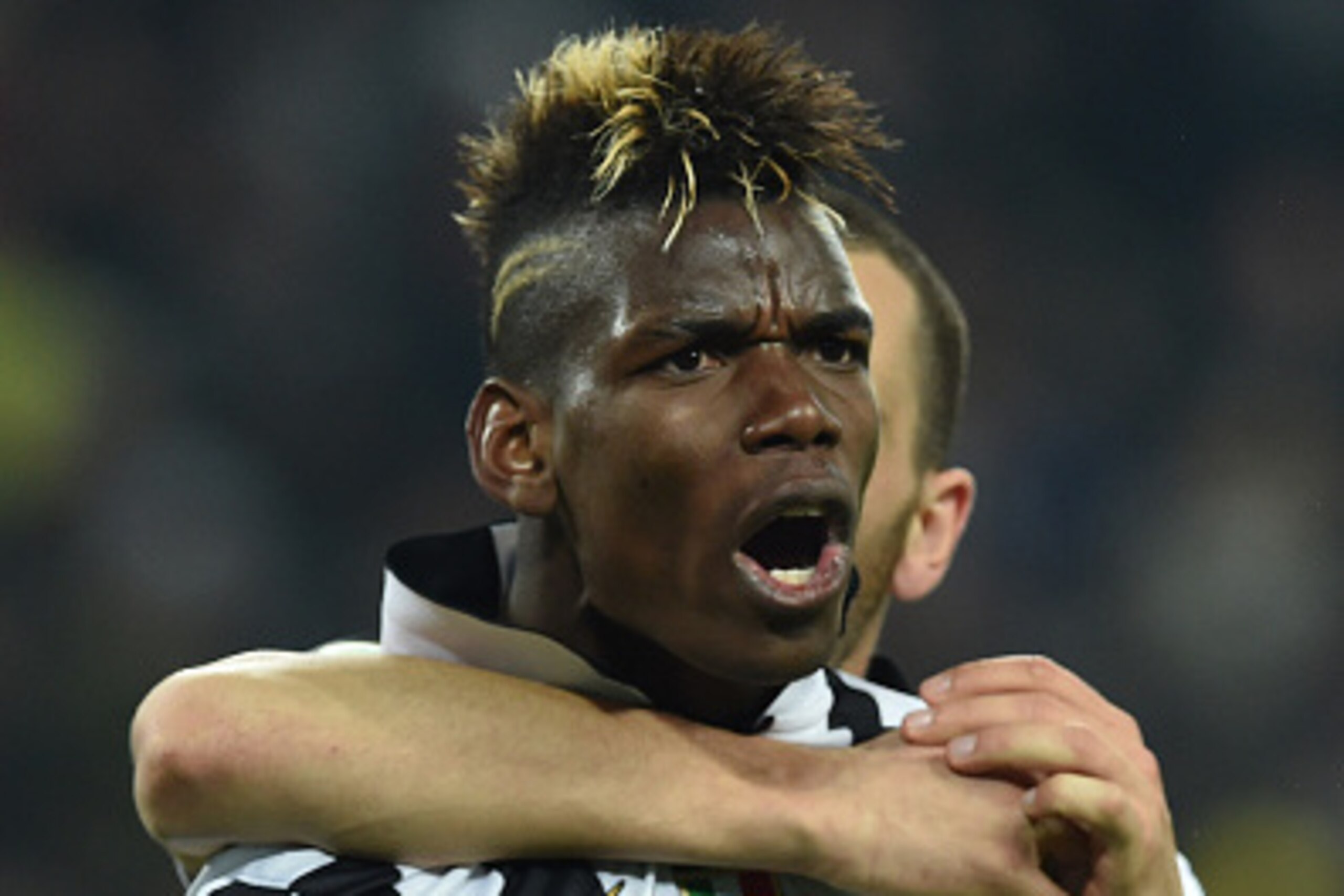 TURIN, ITALY - MARCH 09:  Paul Pogba of Juventus FC celebrates after scoring the opening goal during the Serie A match between Juventus FC and US Sassuolo Calcio at Juventus Arena on March 9, 2015 in Turin, Italy.  (Photo by Valerio Pennicino/Getty Images