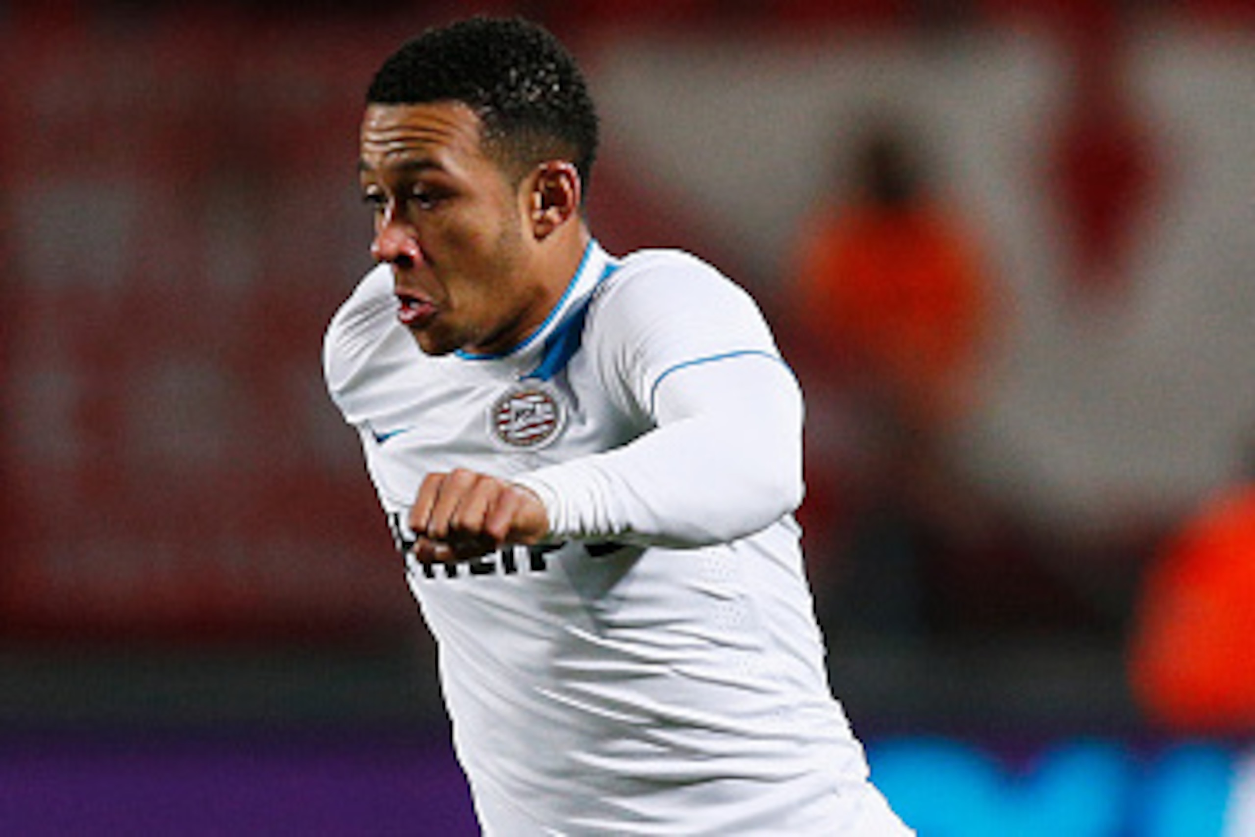ENSCHEDE, NETHERLANDS - APRIL 04:  Memphis Depay of PSV in action during the Dutch Eredivisie match between FC Twente and PSV Eindhoven held at De Grolsch Veste Stadium on April 4, 2015 in Enschede, Netherlands.  (Photo by Dean Mouhtaropoulos/Getty Images