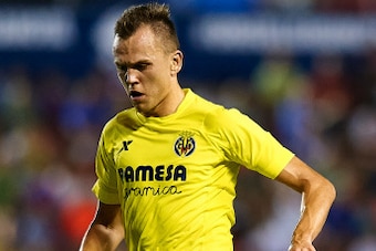 VALENCIA, SPAIN - AUGUST 24:  Denis Cheryshev of Villarreal CF runs with the ball during the la Liga match between Levante UD and Villarreal CF at Ciutat de Valencia on August 24, 2014 in Valencia, Spain.  (Photo by Manuel Queimadelos Alonso/Getty Images)