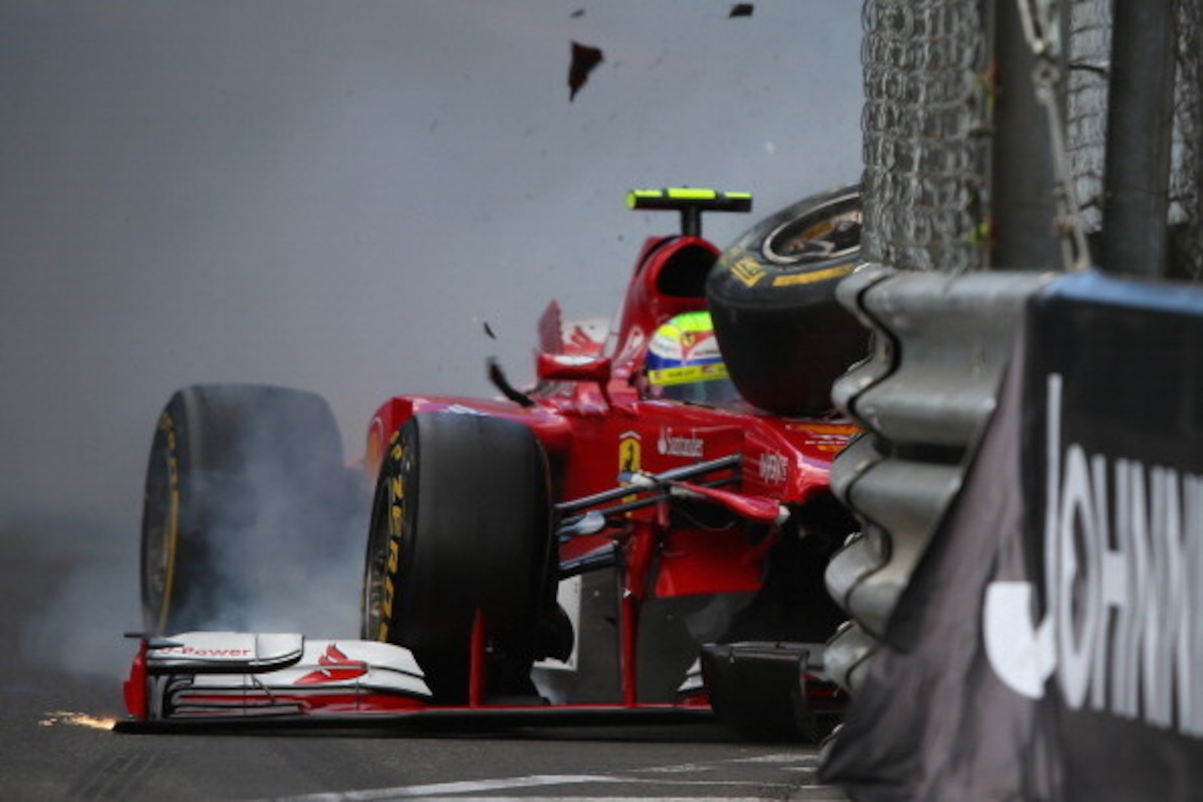 MONTE-CARLO, MONACO - MAY 25:  Felipe Massa of Brazil and Ferrari crashes at St Devote during qualifying for the Monaco Formula One Grand Prix at the Circuit de Monaco on May 25, 2013 in Monte-Carlo, Monaco.  (Photo by Bryn Lennon/Getty Images)
