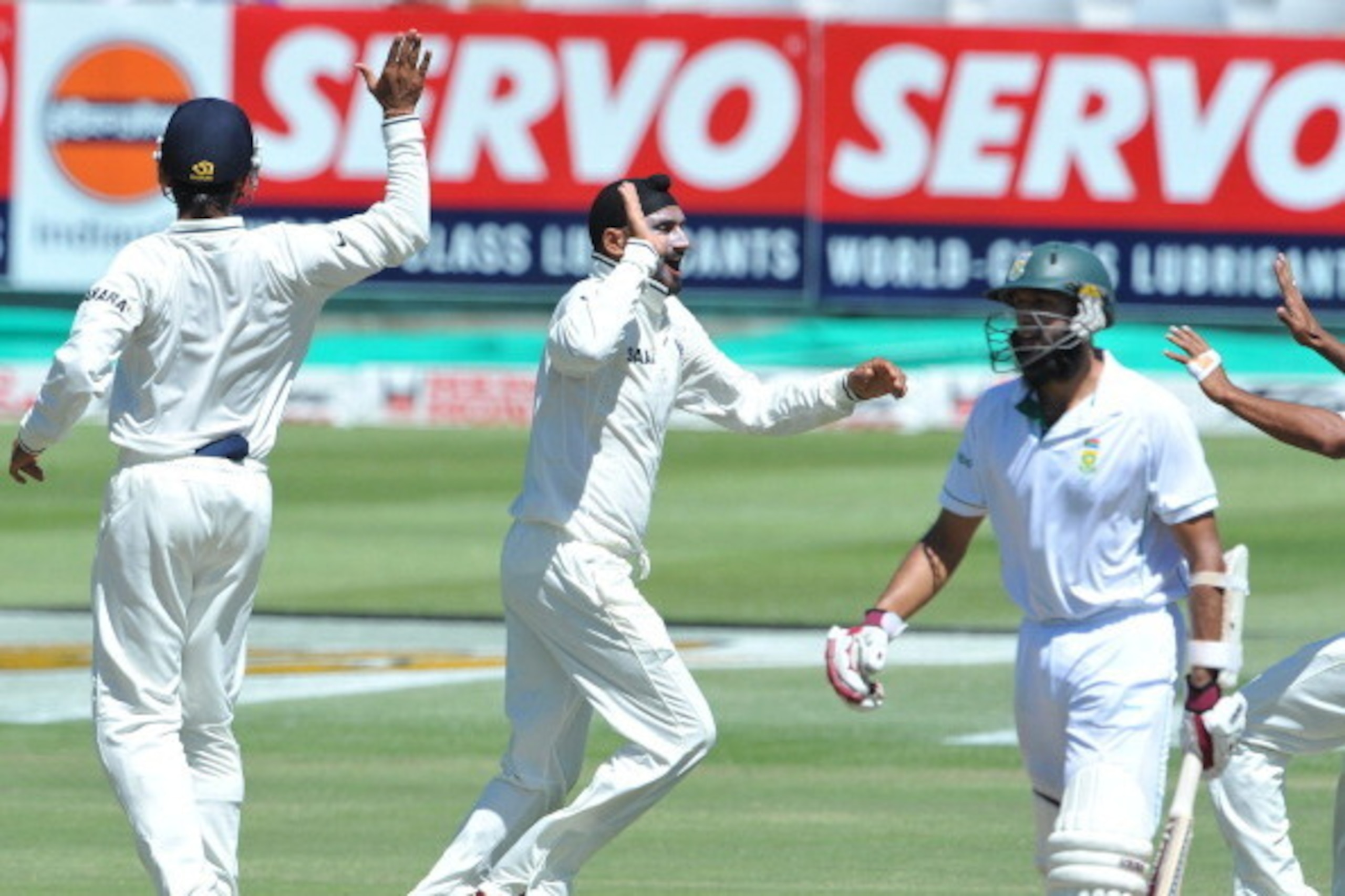 CAPE TOWN, SOUTH AFRICA - JANUARY 05:  Harbhajan Singh of India celebrates the wicket of Hashim Amla of South Africa for 2 runs  during day 4 of the 3rd Test match between South Africa and India at Newlands Stadium on January 05, 2011 in Cape Town, South 