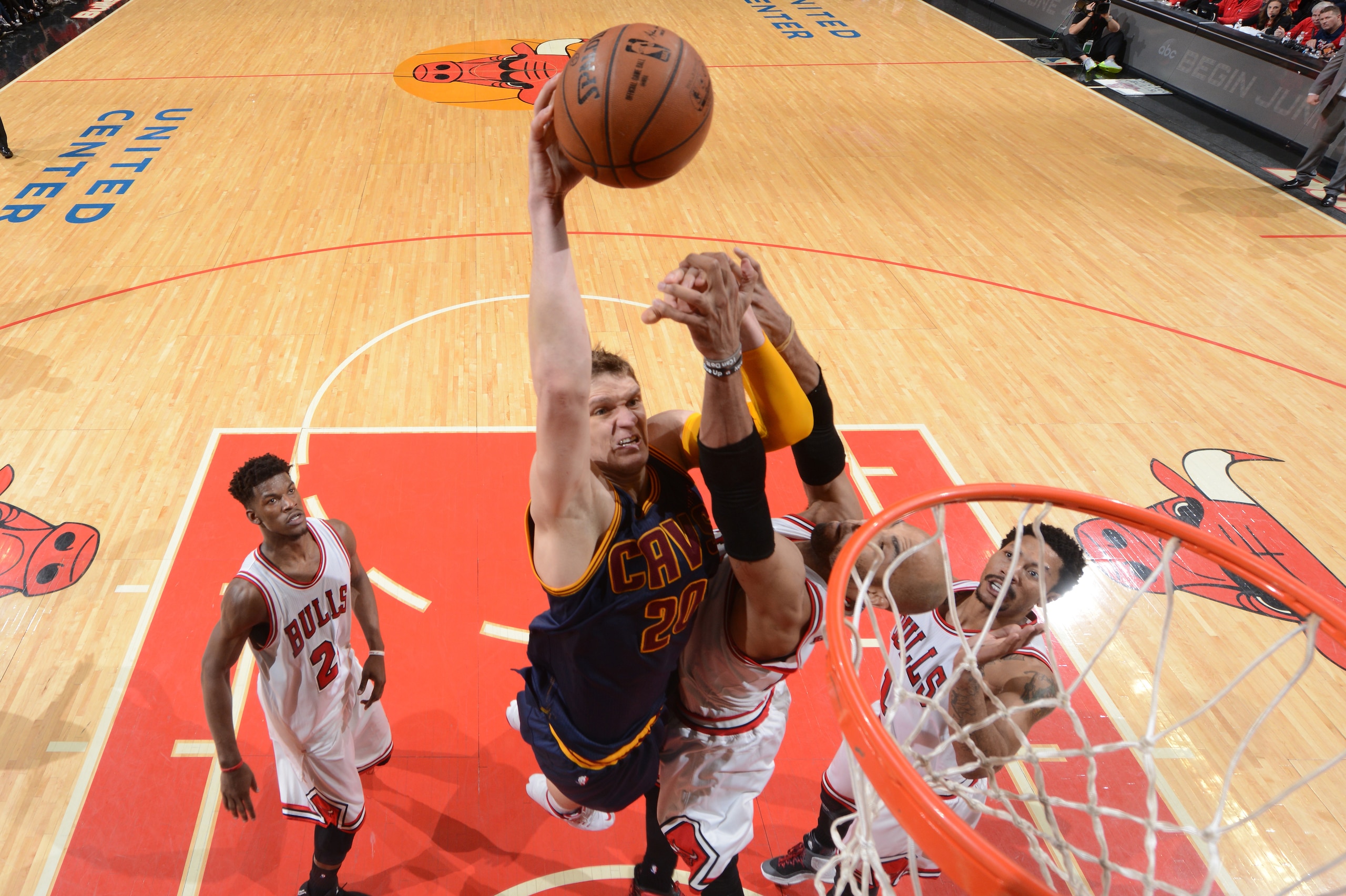 CHICAGO,IL : Timofey Mozgov #20 of the Cleveland Cavaliers goes up for the dunk against the Chicago Bulls at the United Center During Game Four of the Eastern Conference Semifinals during the 2015 NBA Playoffs on May 10, 2015 in Chicago, Illinois NOTE TO CHICAGO,IL : Timofey Mozgov #20 of the Cleveland Cavaliers goes up for the dunk against the Chicago Bulls at the United Center During Game Four of the Eastern Conference Semifinals during the 2015 NBA Playoffs on May 10, 2015 in Chicago, Illinois NOTE TO