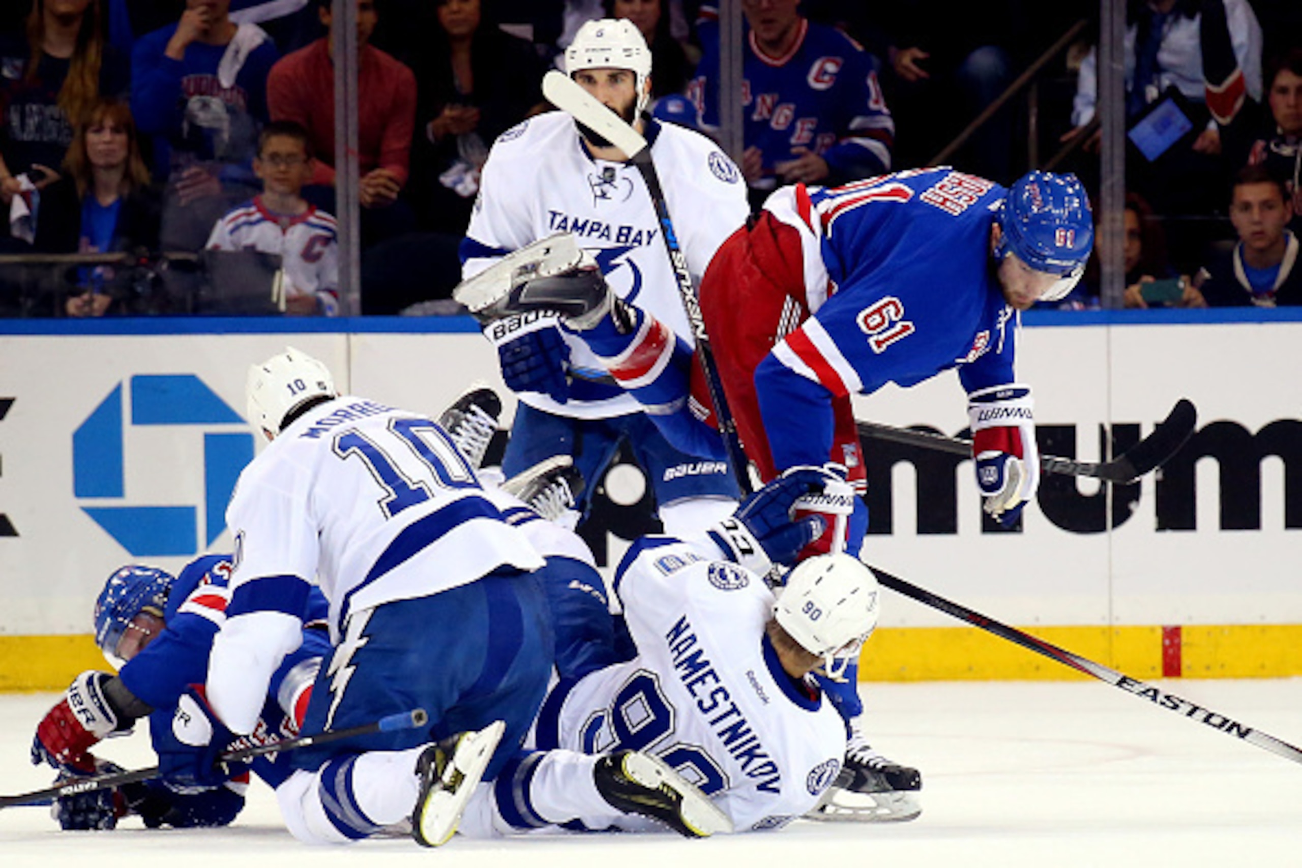 NEW YORK, NY - MAY 16: Rick Nash #61 of the New York Rangers gets tangled up with Vladislav Namestnikov #90 of the Tampa Bay Lightning in Game One of the Eastern Conference Finals during the 2015 NHL Stanley Cup Playoffs at Madison Square Garden on May 16