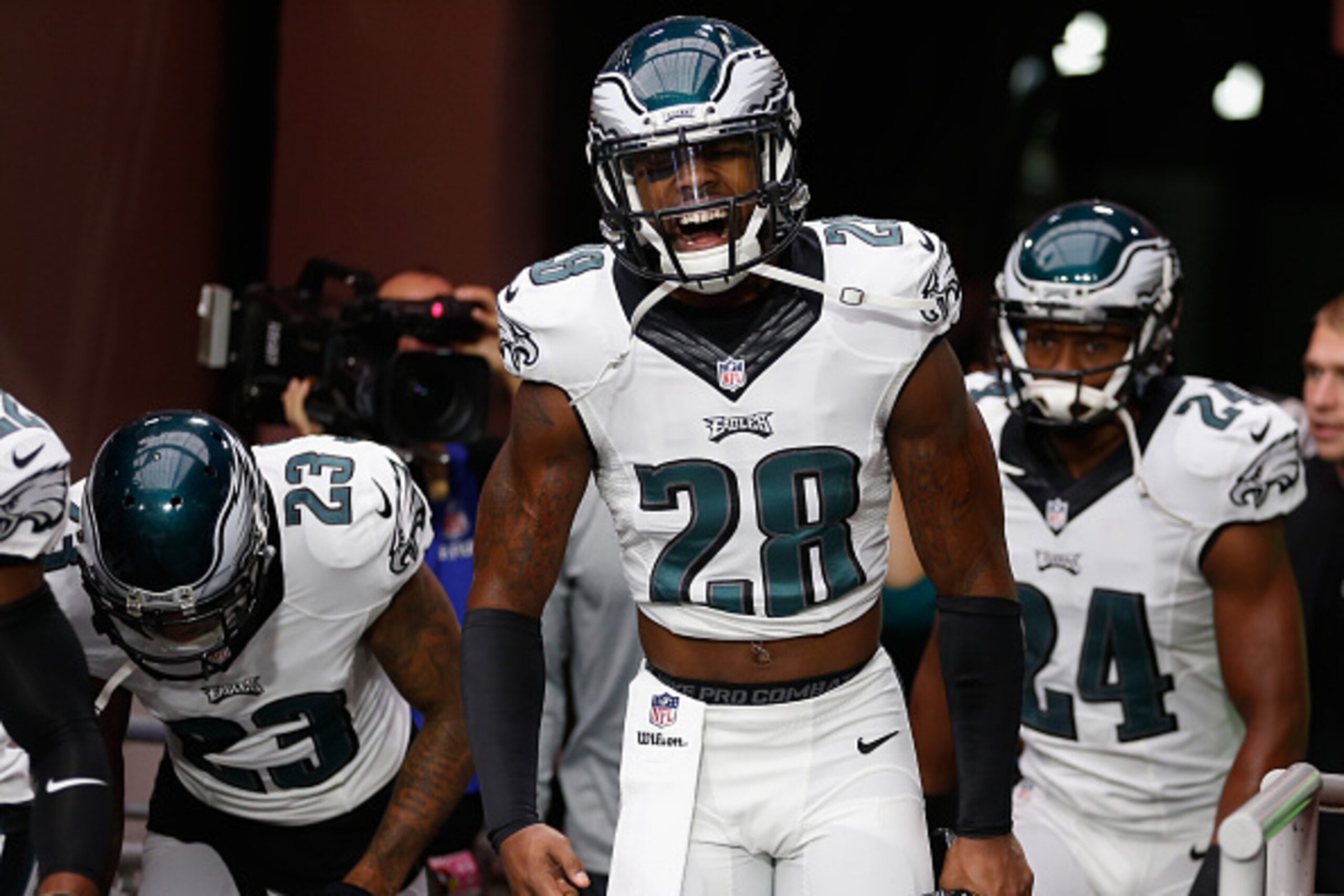 GLENDALE, AZ - OCTOBER 26: Free safety Earl Wolff #28 of the Philadelphia Eagles leads teammates onto the field prior to the NFL game against the Arizona Cardinals at the University of Phoenix Stadium on October 26, 2014 in Glendale, Arizona.  (Photo by C